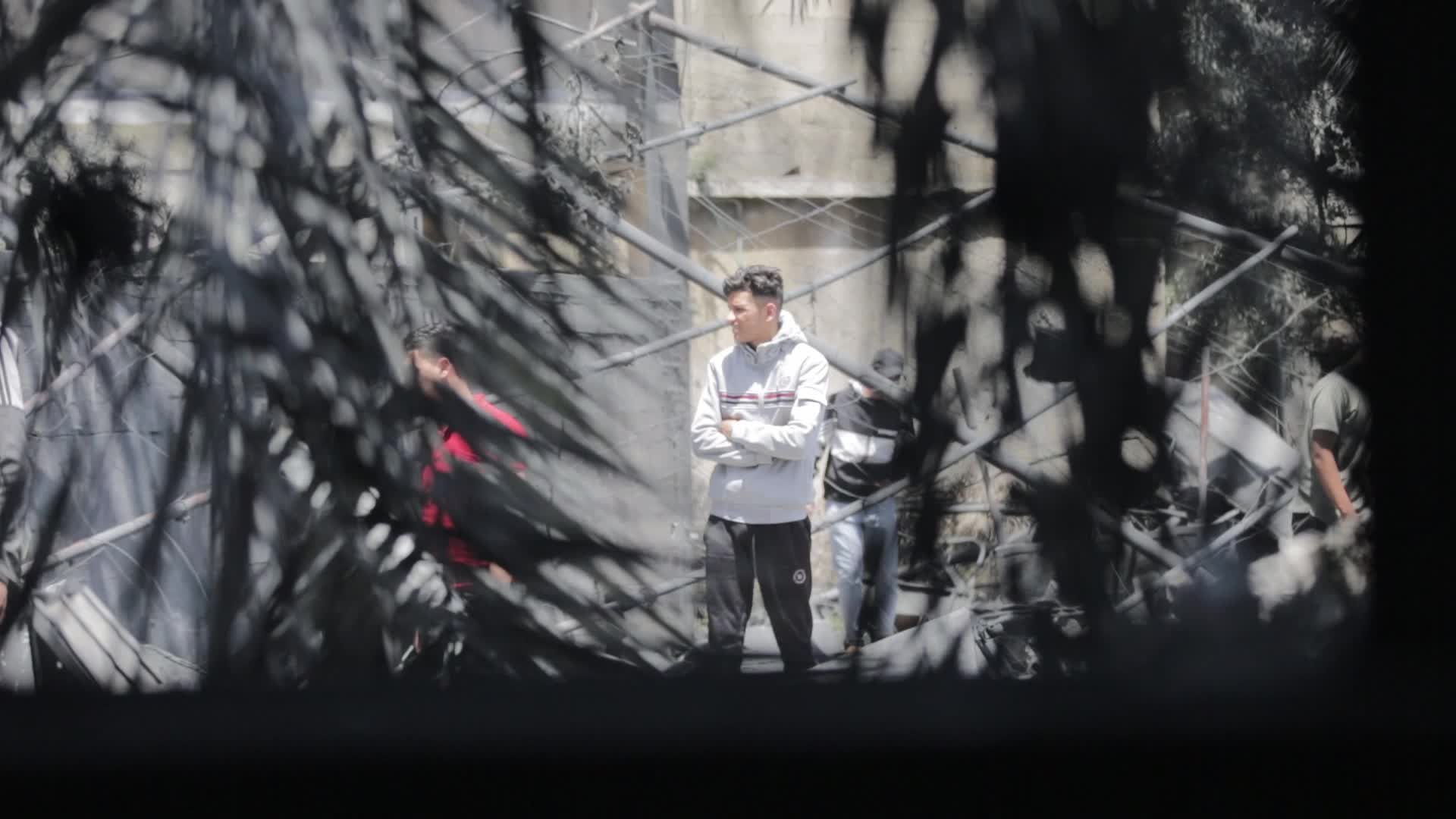 Palestinians inspect damage following Israeli air strikes