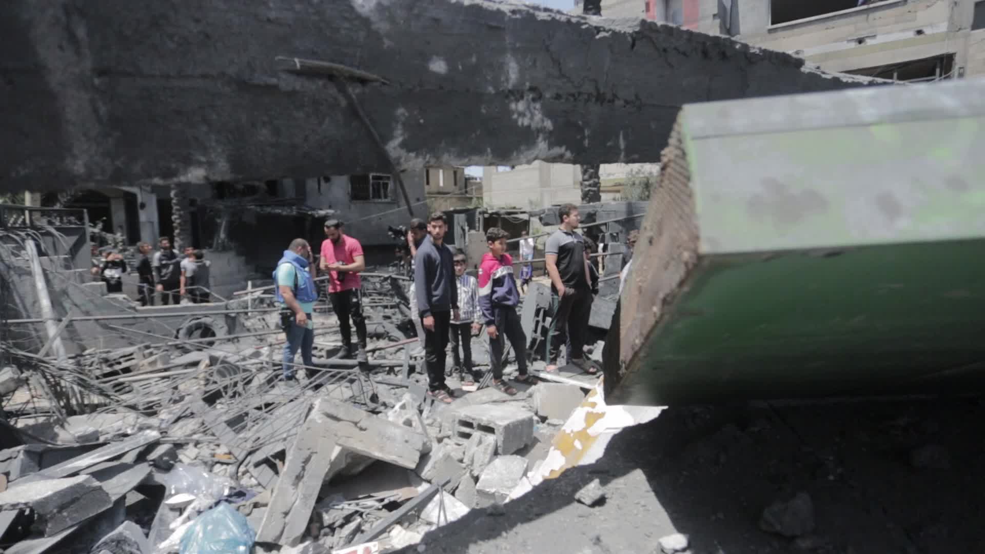 Palestinians inspect damage following Israeli air strikes