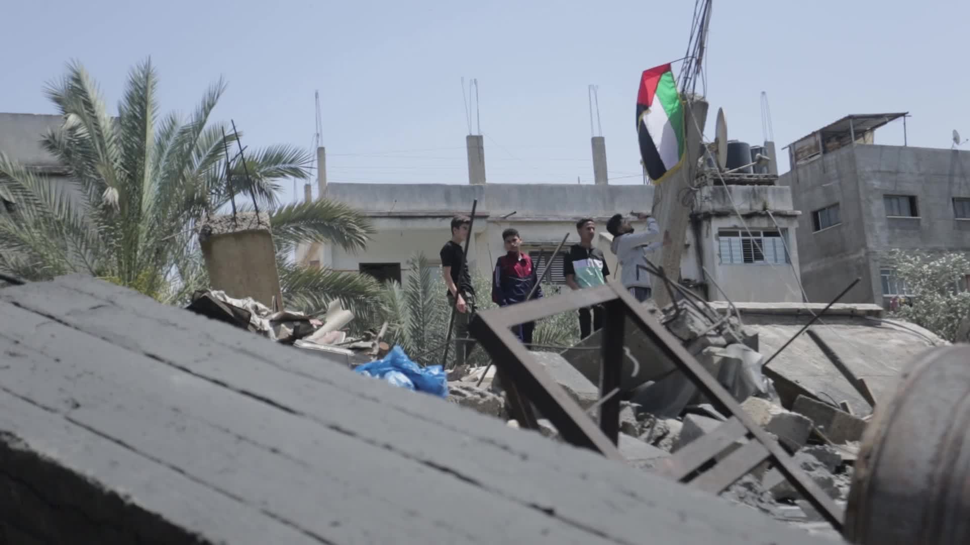 Palestinians inspect damage following Israeli air strikes