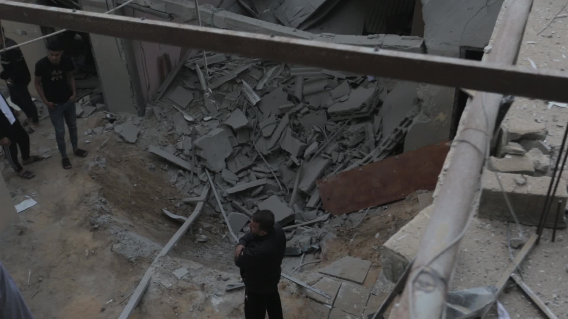 Palestinians inspect damage following Israeli air strikes in Gaza