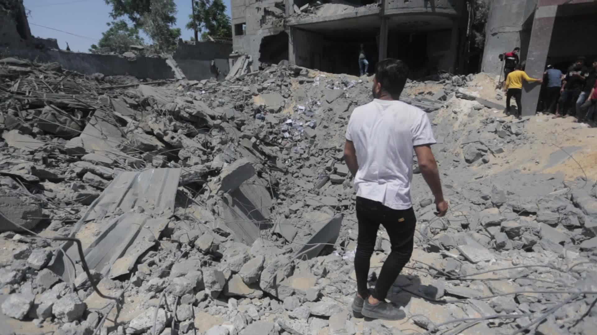 Palestinians inspect damage following Israeli air strikes in Gaza 