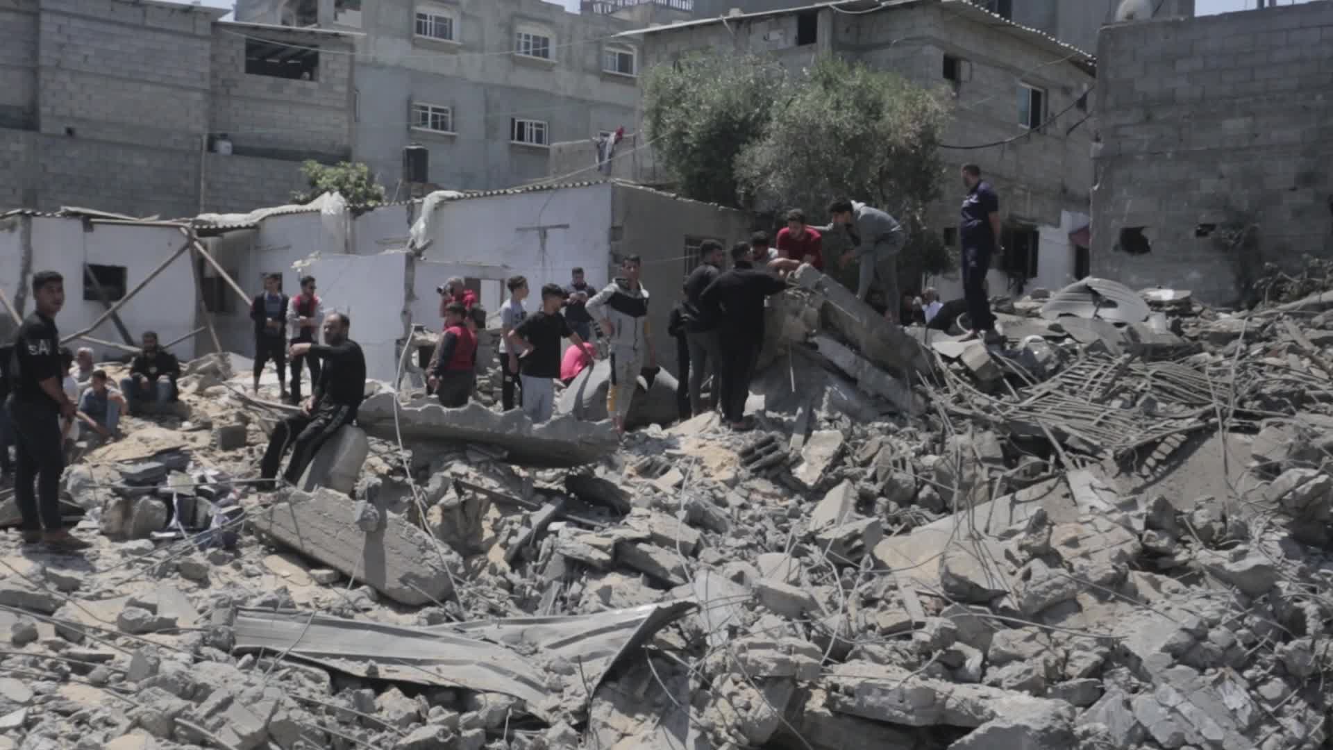 Palestinians inspect damage following Israeli air strikes in Gaza 