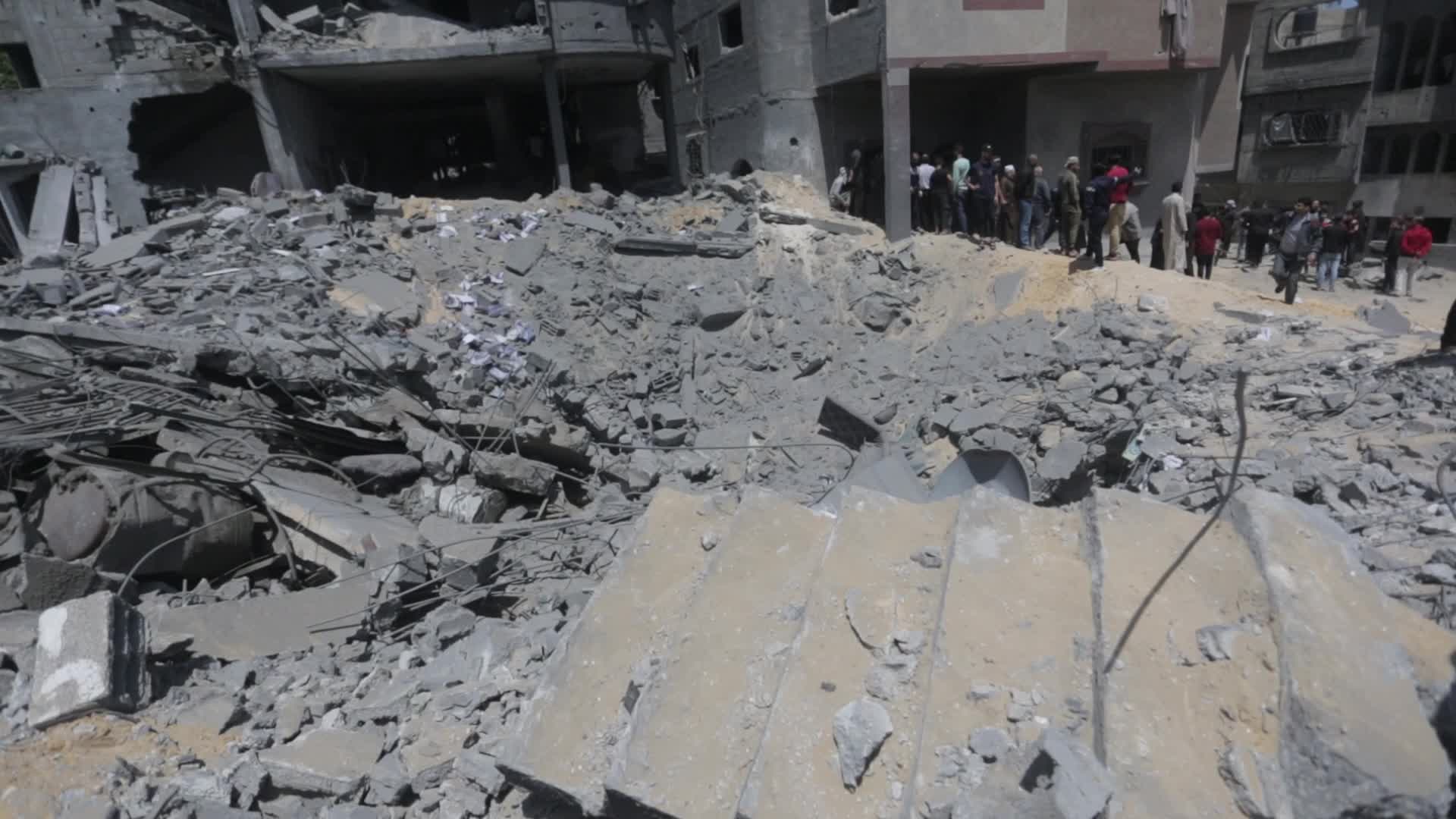 Palestinians inspect damage following Israeli air strikes in Gaza 