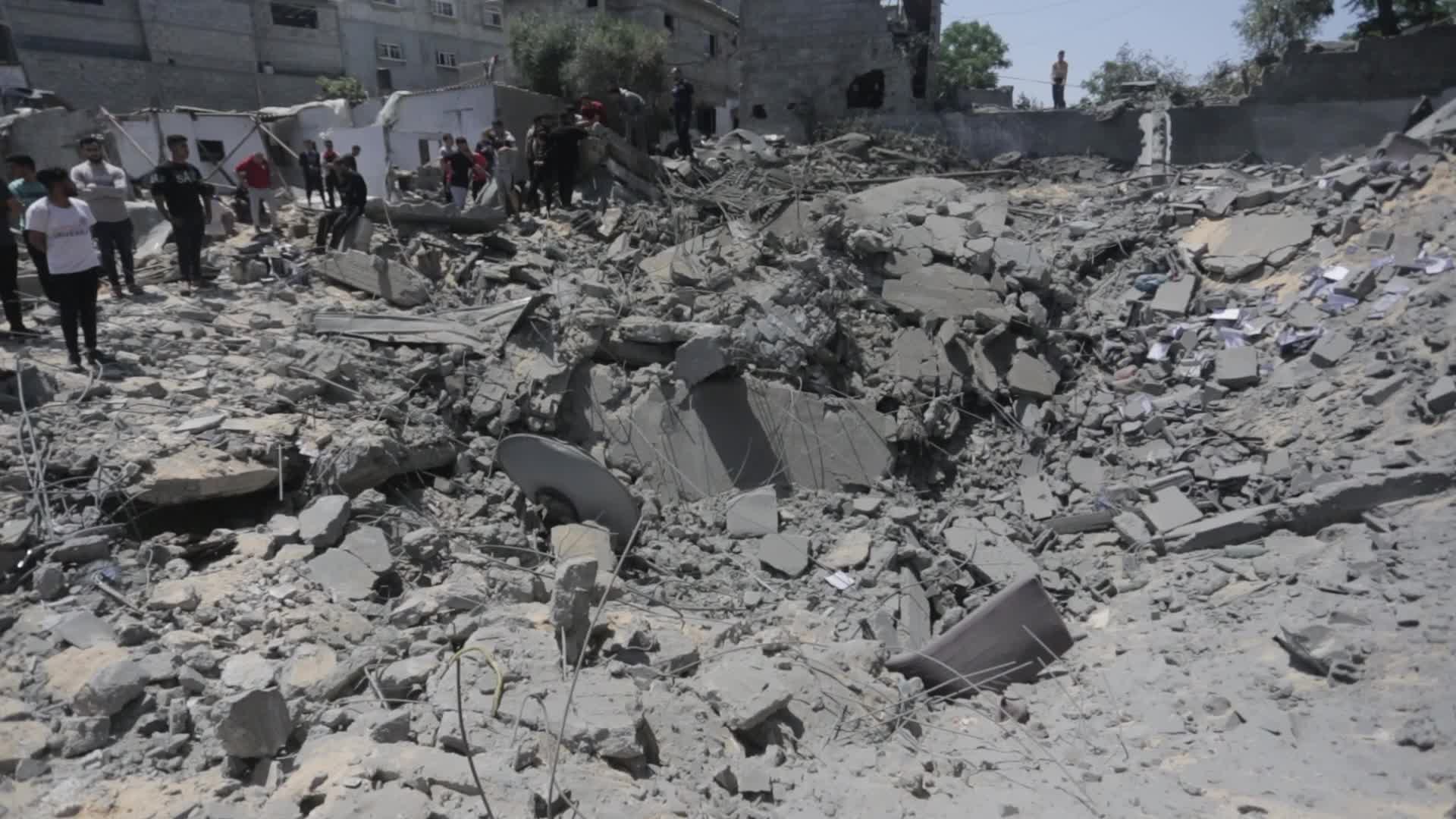 Palestinians inspect damage following Israeli air strikes in Gaza 