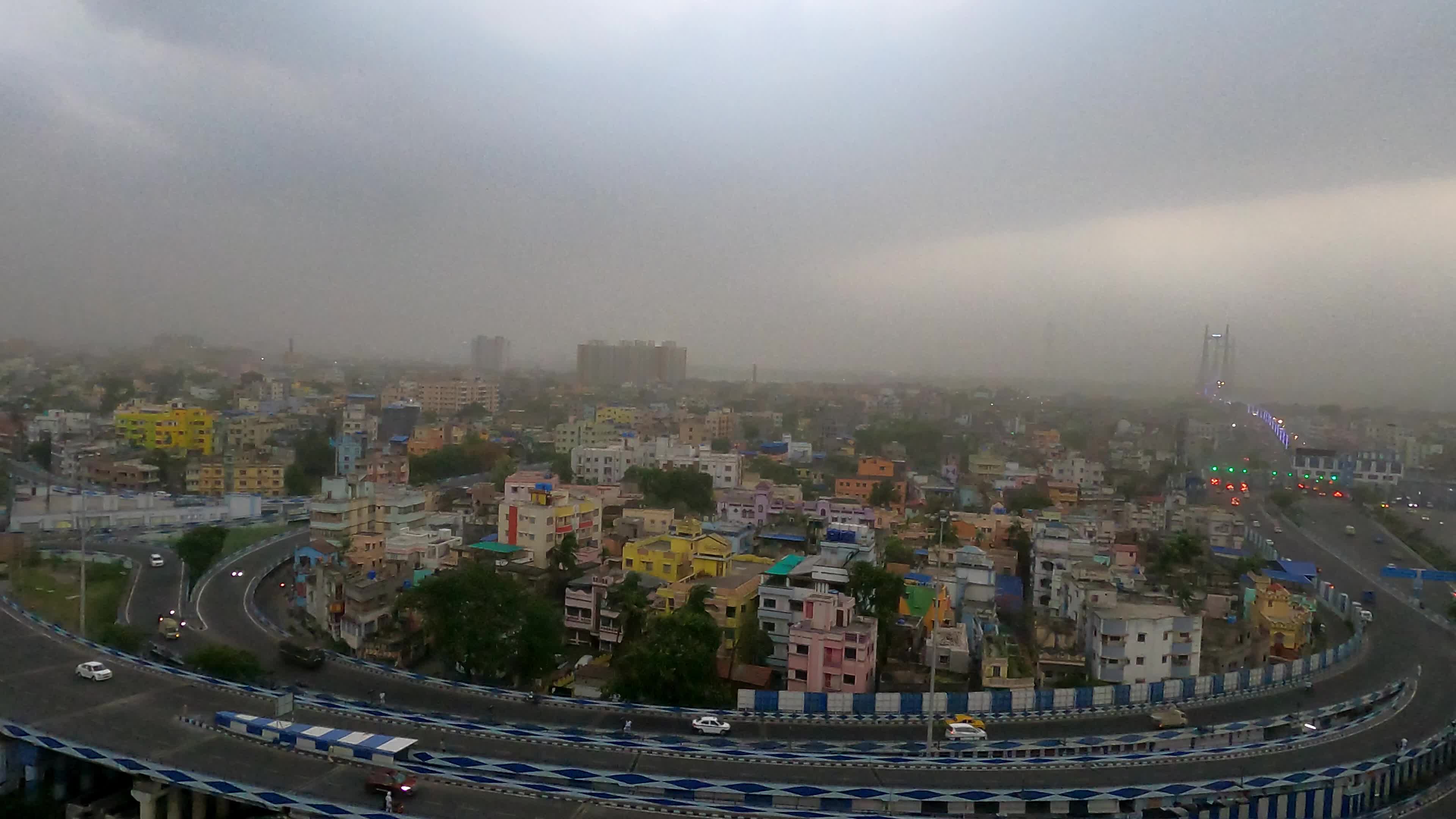 Black clouds hover in the sky in Kolkata, India