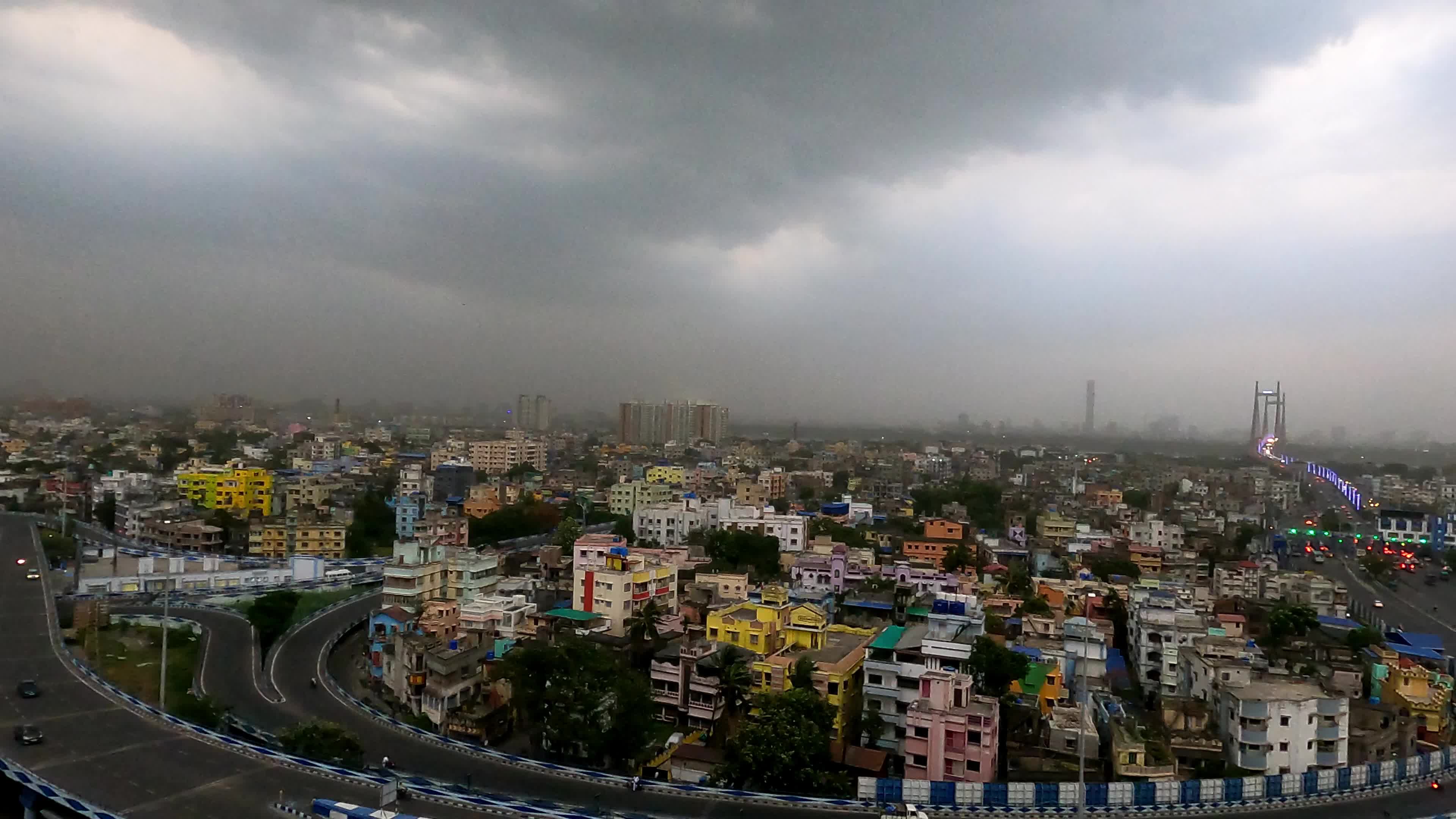 Black clouds hover in the sky in Kolkata, India