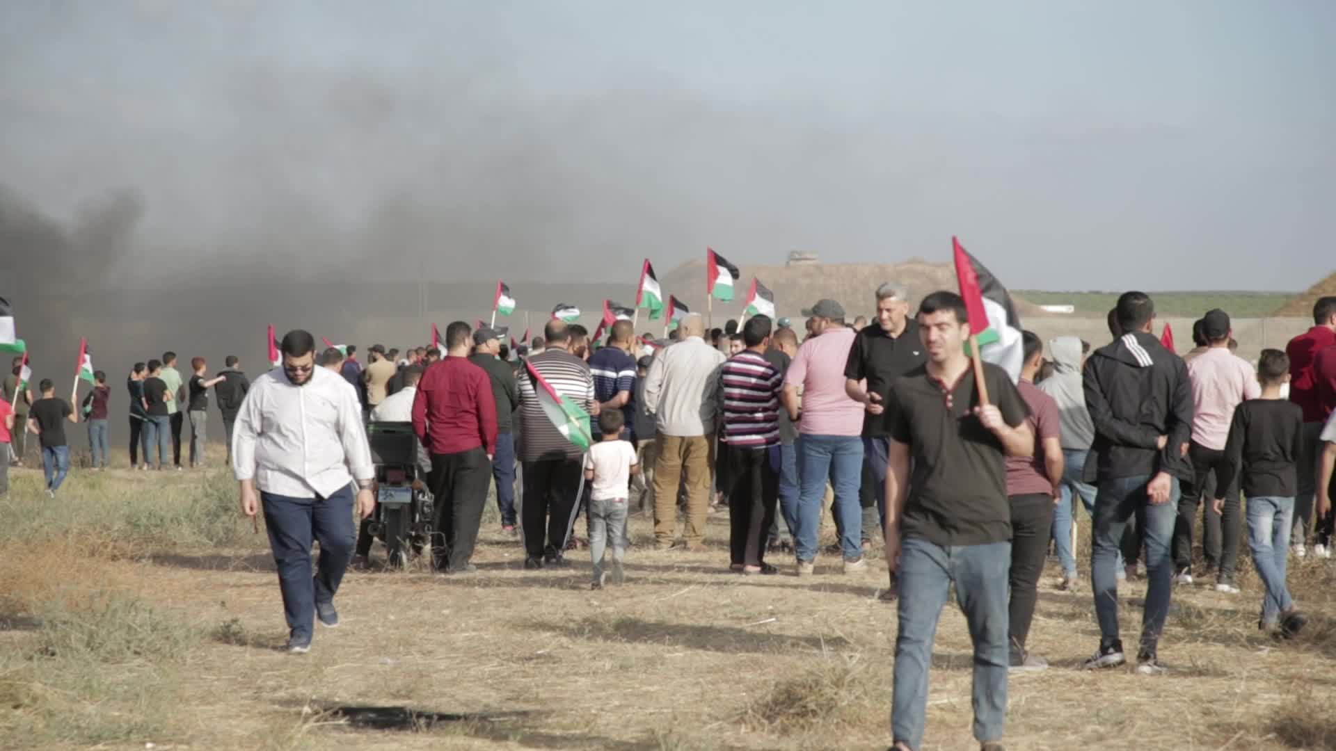 Palestinians hold a counter 'Flag March' against Israeli march 