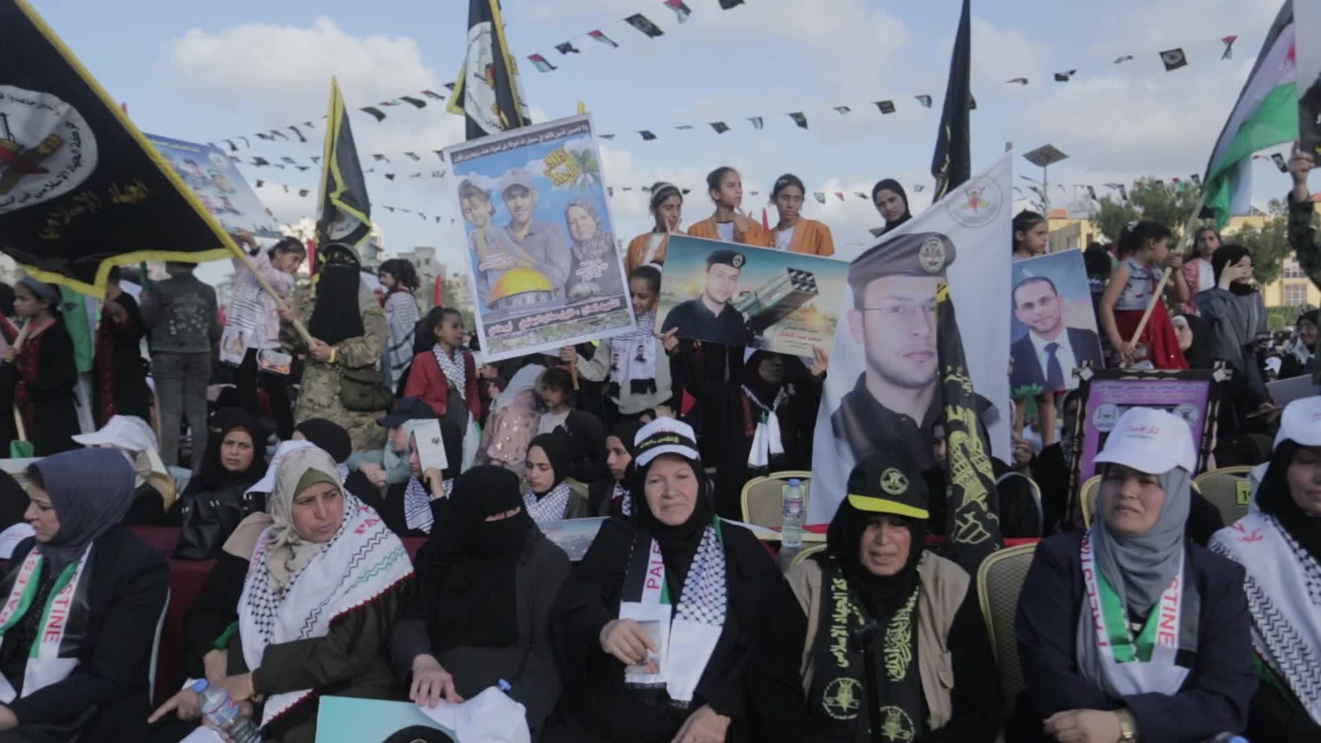 Supporters of Islamic Jihad in Gaza City, raising flags and pictures in memory of the group's leaders and activists who were killed by Israel in the recent conflict