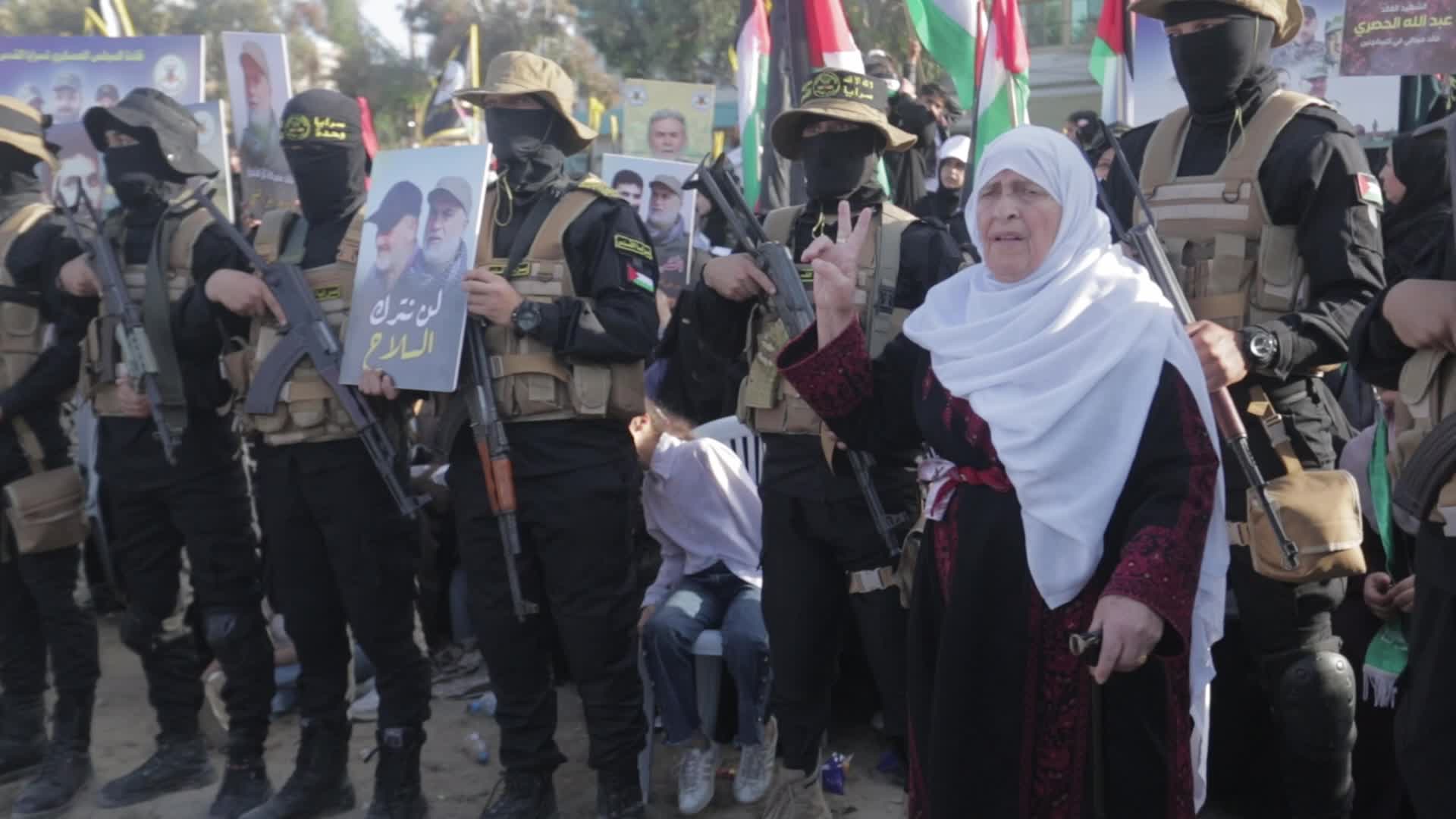 Supporters of Islamic Jihad in Gaza City, raising flags and pictures in memory of the group's leaders and activists who were killed by Israel in the recent conflict