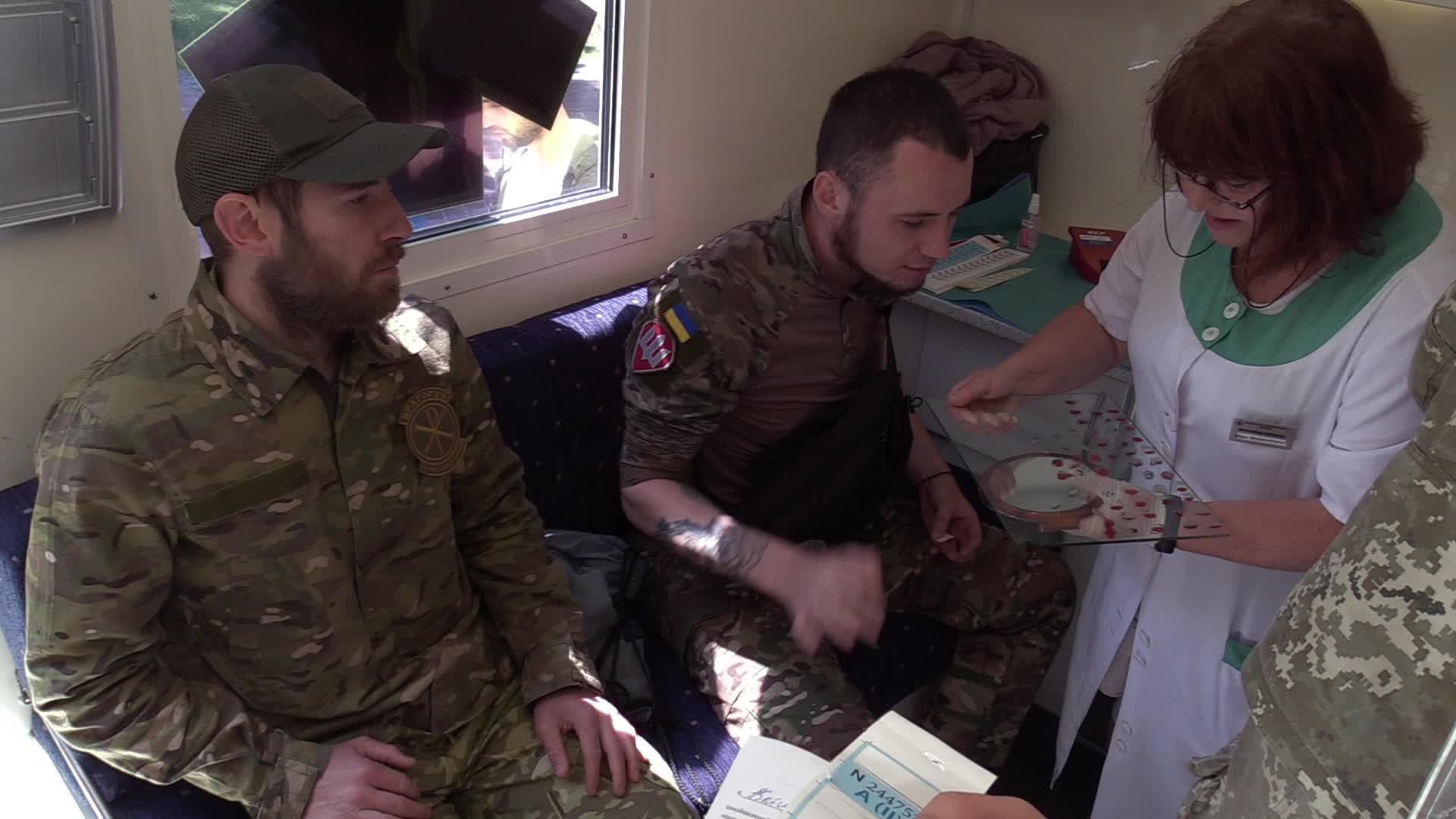 Fighters of Russian Volunteer Corps donate blood for Ukrainian Army in Kyiv, amid Russia's invasion of Ukraine.