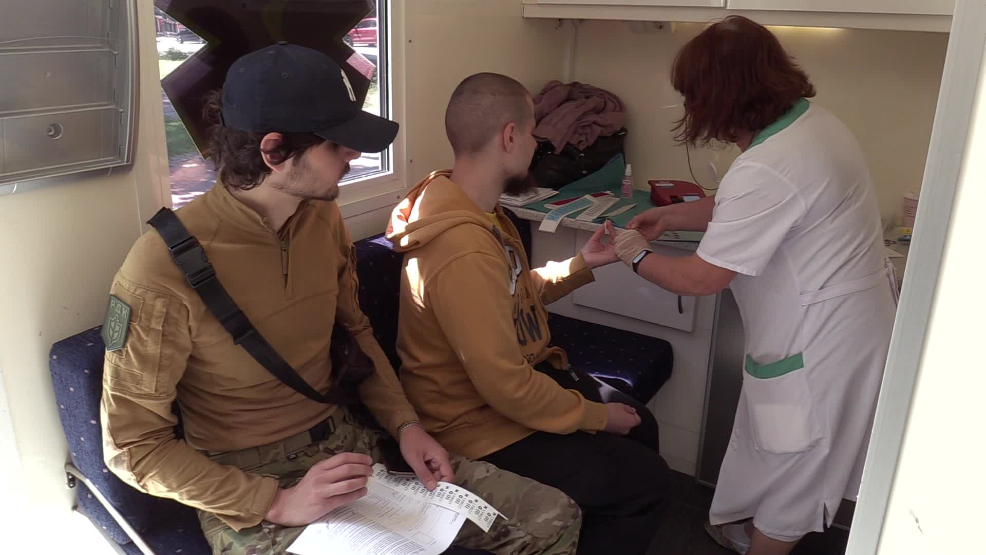 Fighters of Russian Volunteer Corps donate blood for Ukrainian Army in Kyiv, amid Russia's invasion of Ukraine.