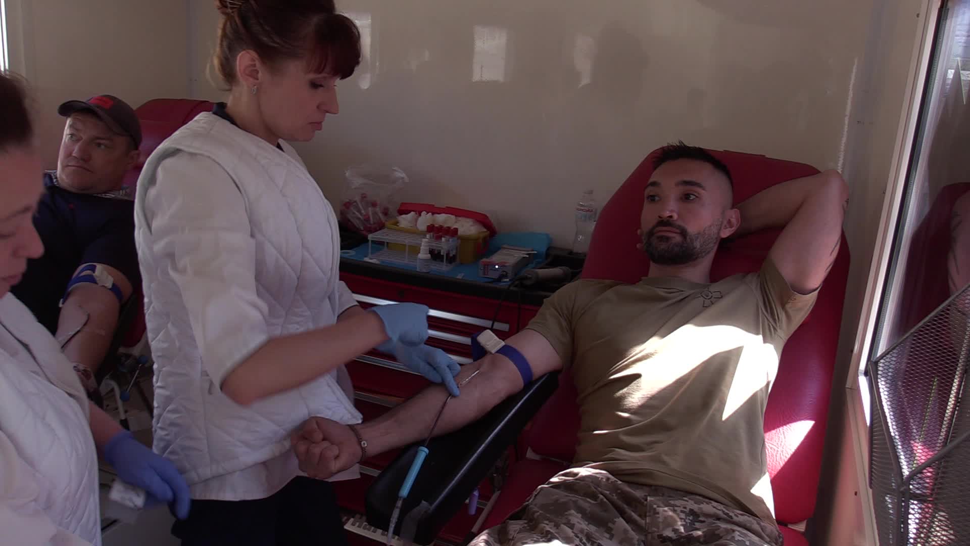 Fighters of Russian Volunteer Corps donate blood for Ukrainian Army in Kyiv, amid Russia's invasion of Ukraine.