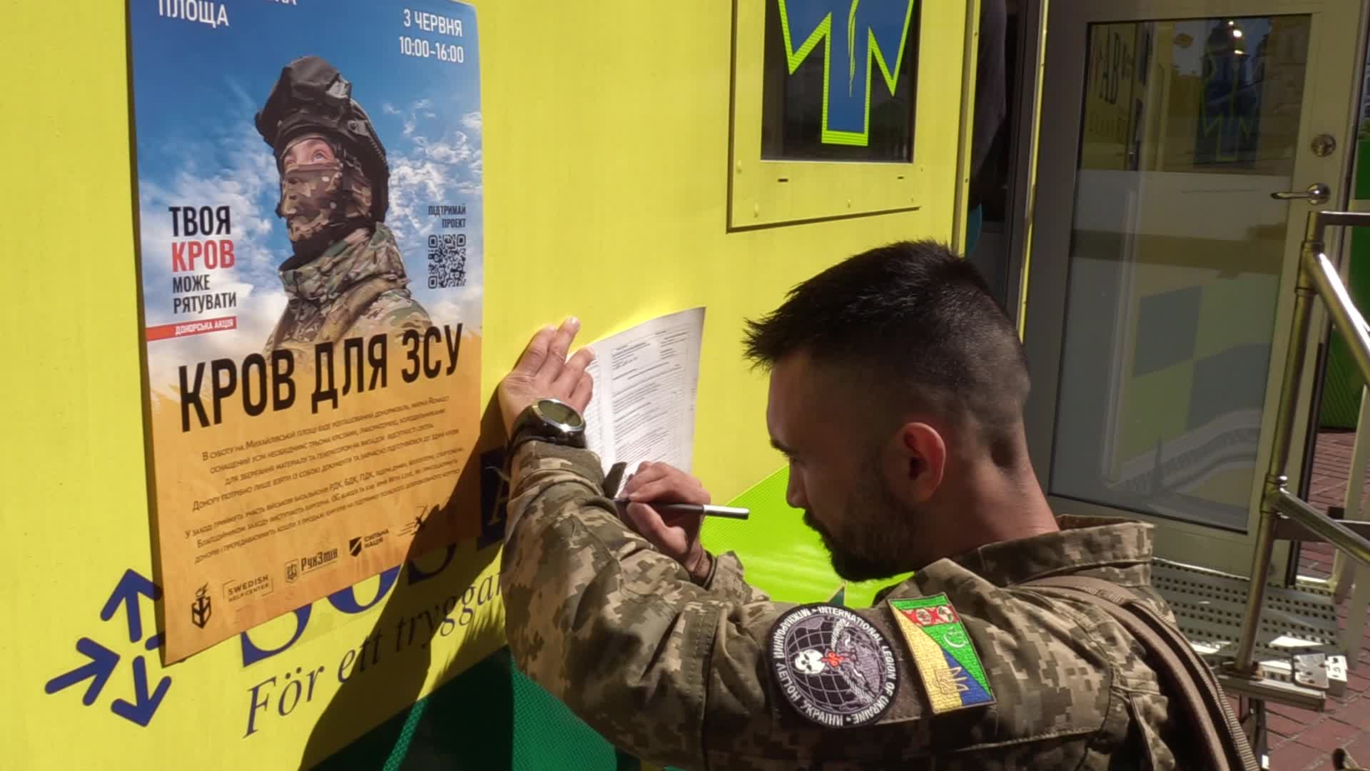 Fighters of Russian Volunteer Corps donate blood for Ukrainian Army in Kyiv, amid Russia's invasion of Ukraine.