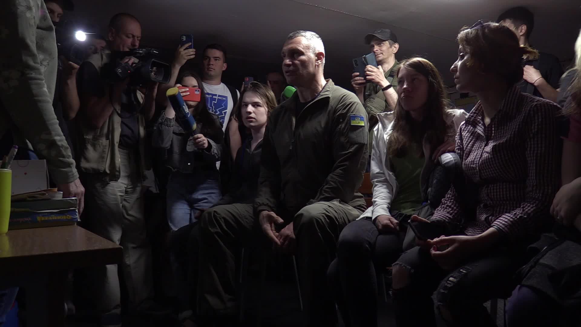 Locals take shelter in a bomb shelter during an air raid alert in Kyiv, amid Russia's invasion of Ukraine