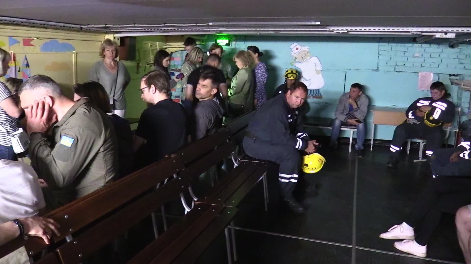 Locals take shelter in a bomb shelter during an air raid alert in Kyiv, amid Russia's invasion of Ukraine