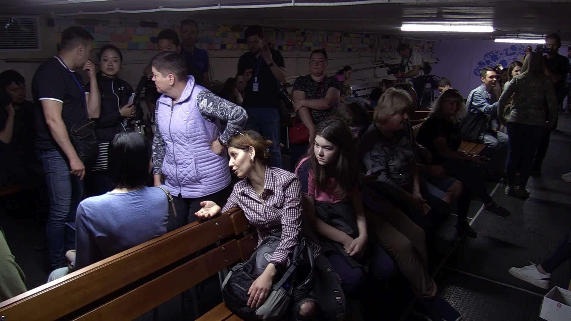 Locals take shelter in a bomb shelter during an air raid alert in Kyiv, amid Russia's invasion of Ukraine