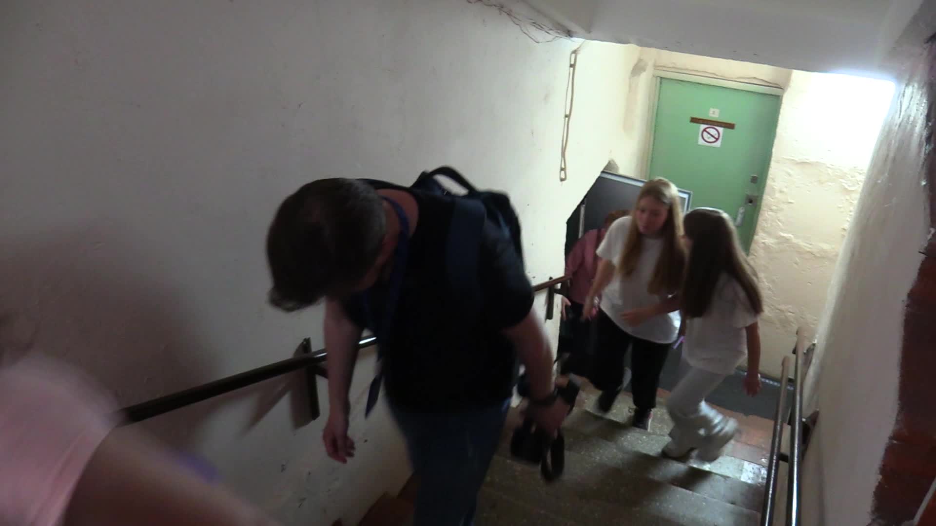Locals take shelter in a bomb shelter during an air raid alert in Kyiv, amid Russia's invasion of Ukraine