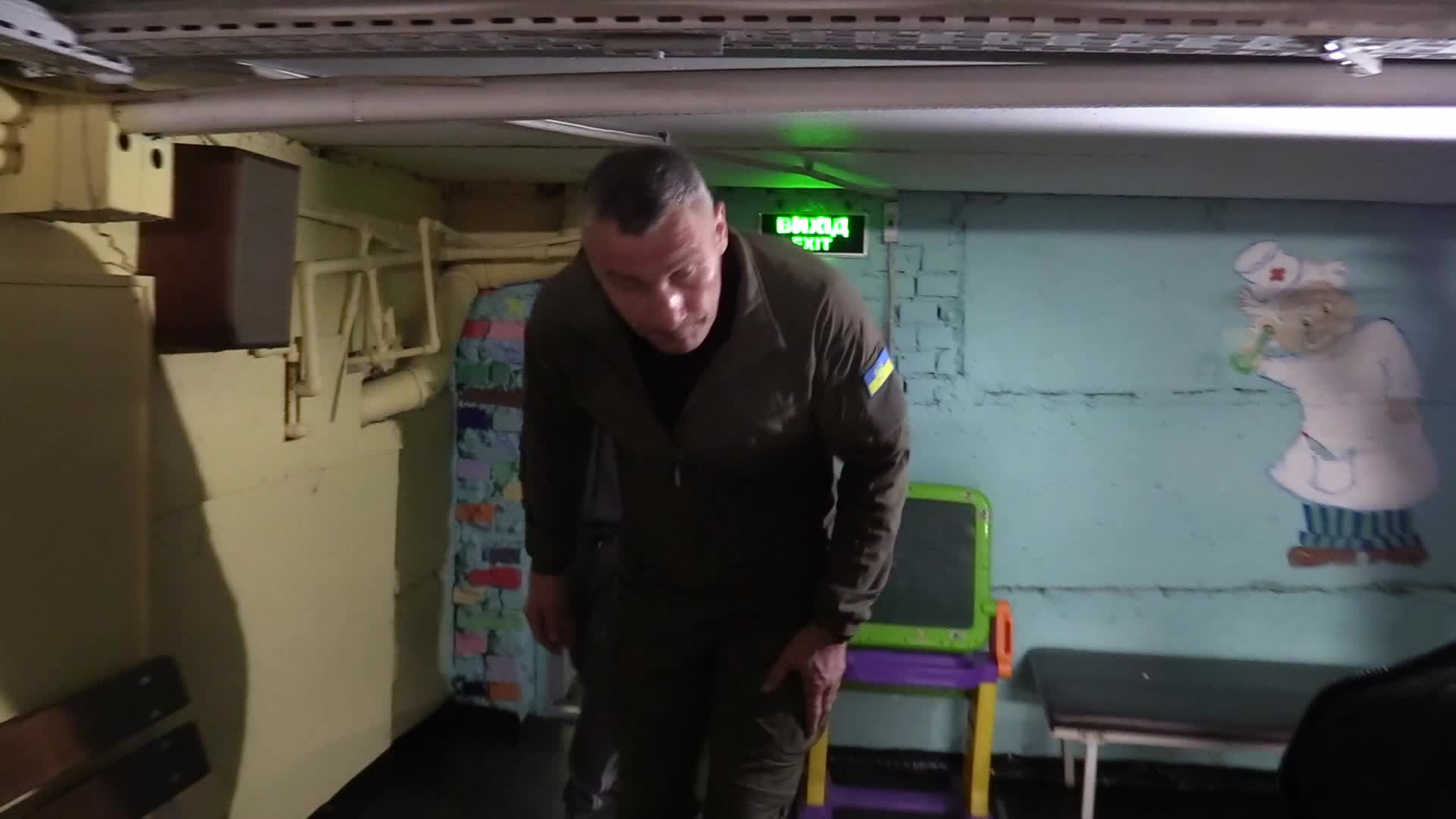 Locals take shelter in a bomb shelter during an air raid alert in Kyiv, amid Russia's invasion of Ukraine