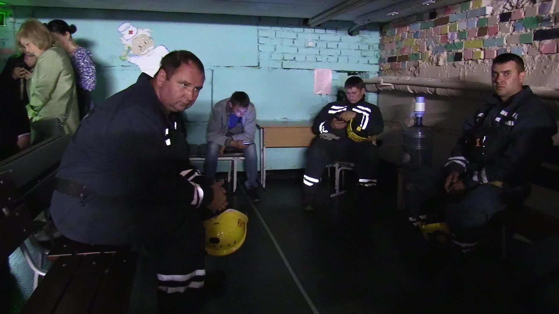 Locals take shelter in a bomb shelter during an air raid alert in Kyiv, amid Russia's invasion of Ukraine