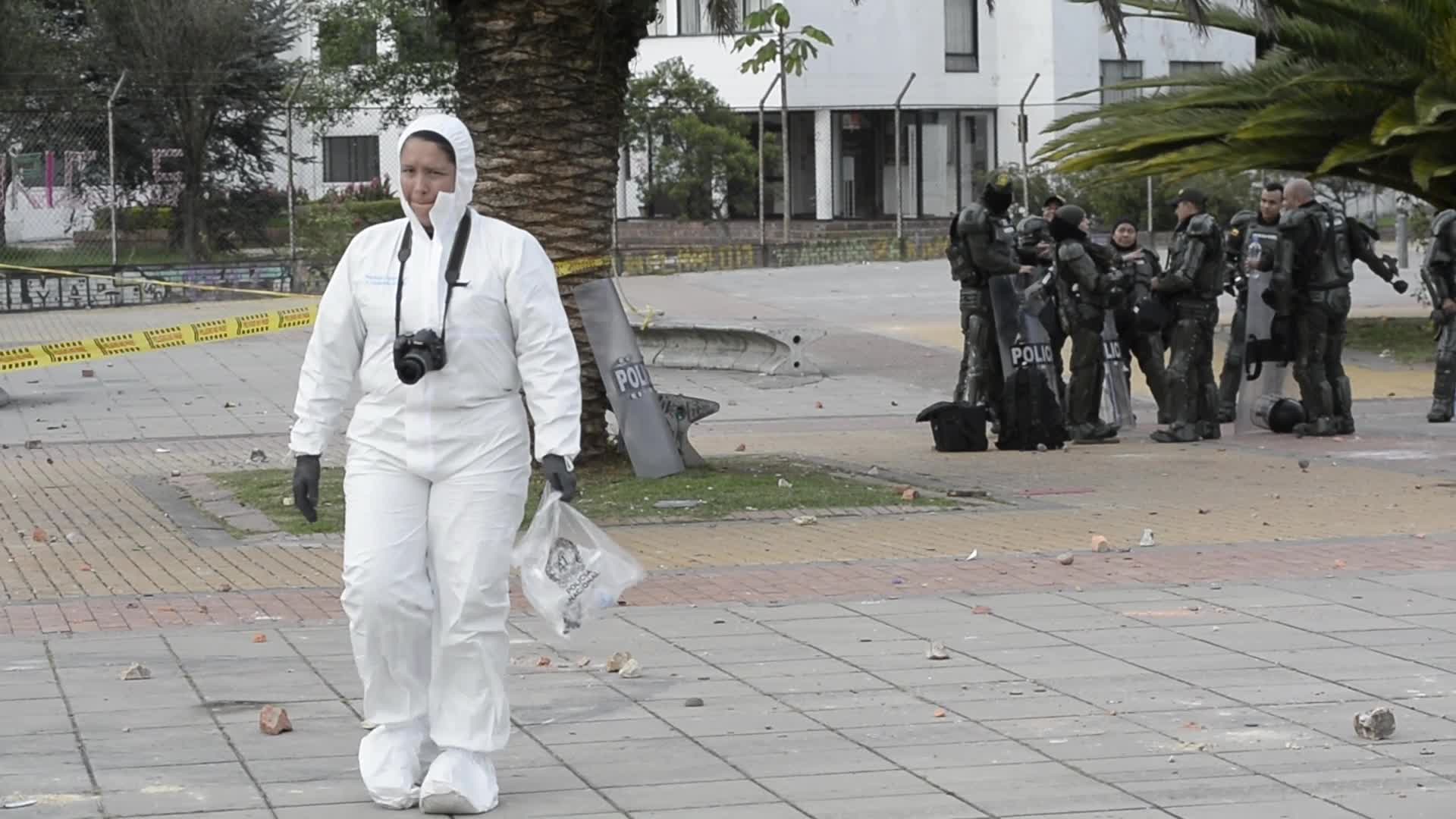 Forensic Police Recover Evidence After Two Police Officers Hit by Explosive During Clashes