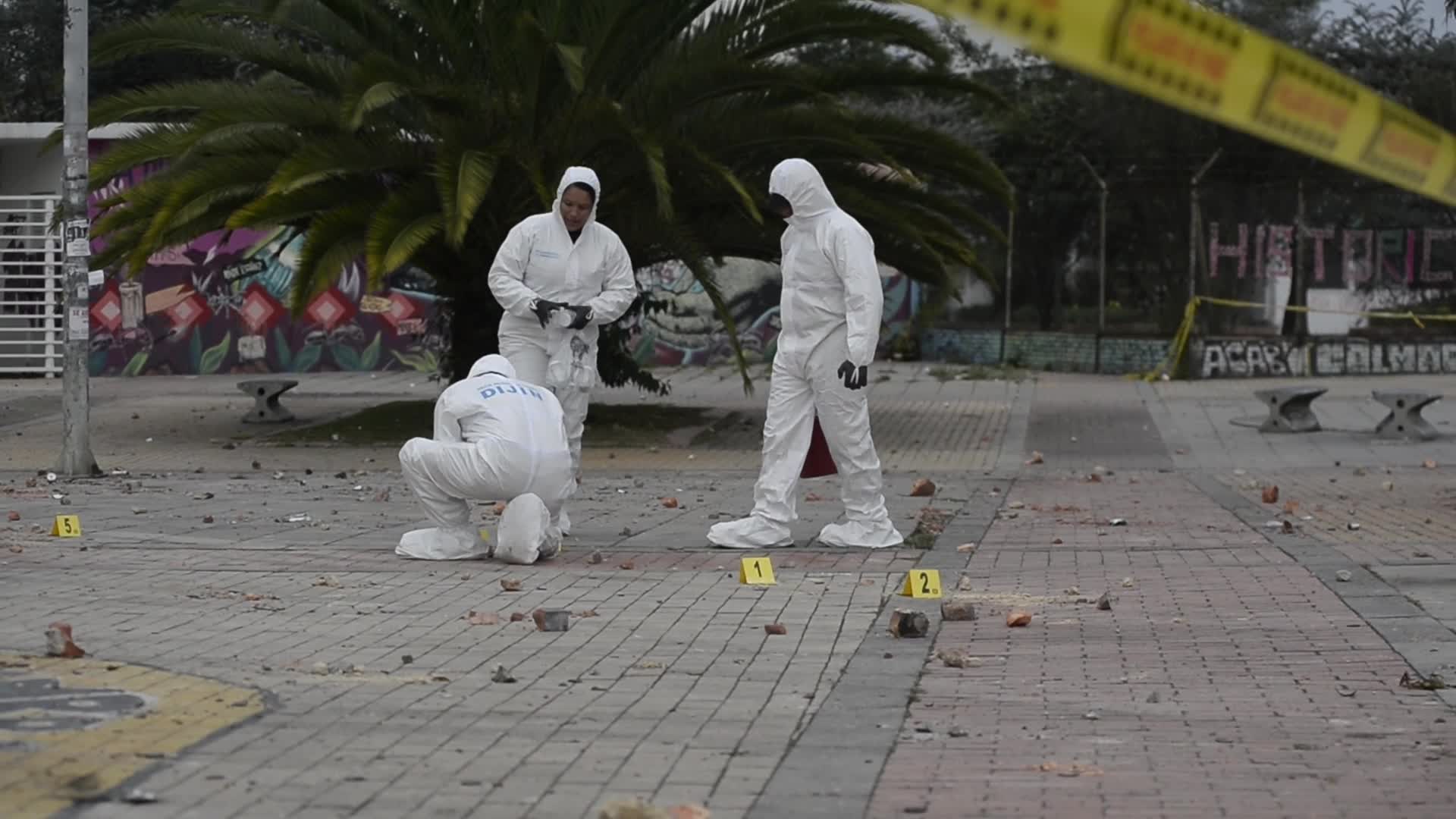 Forensic Police Recover Evidence After Two Police Officers Hit by Explosive During Clashes