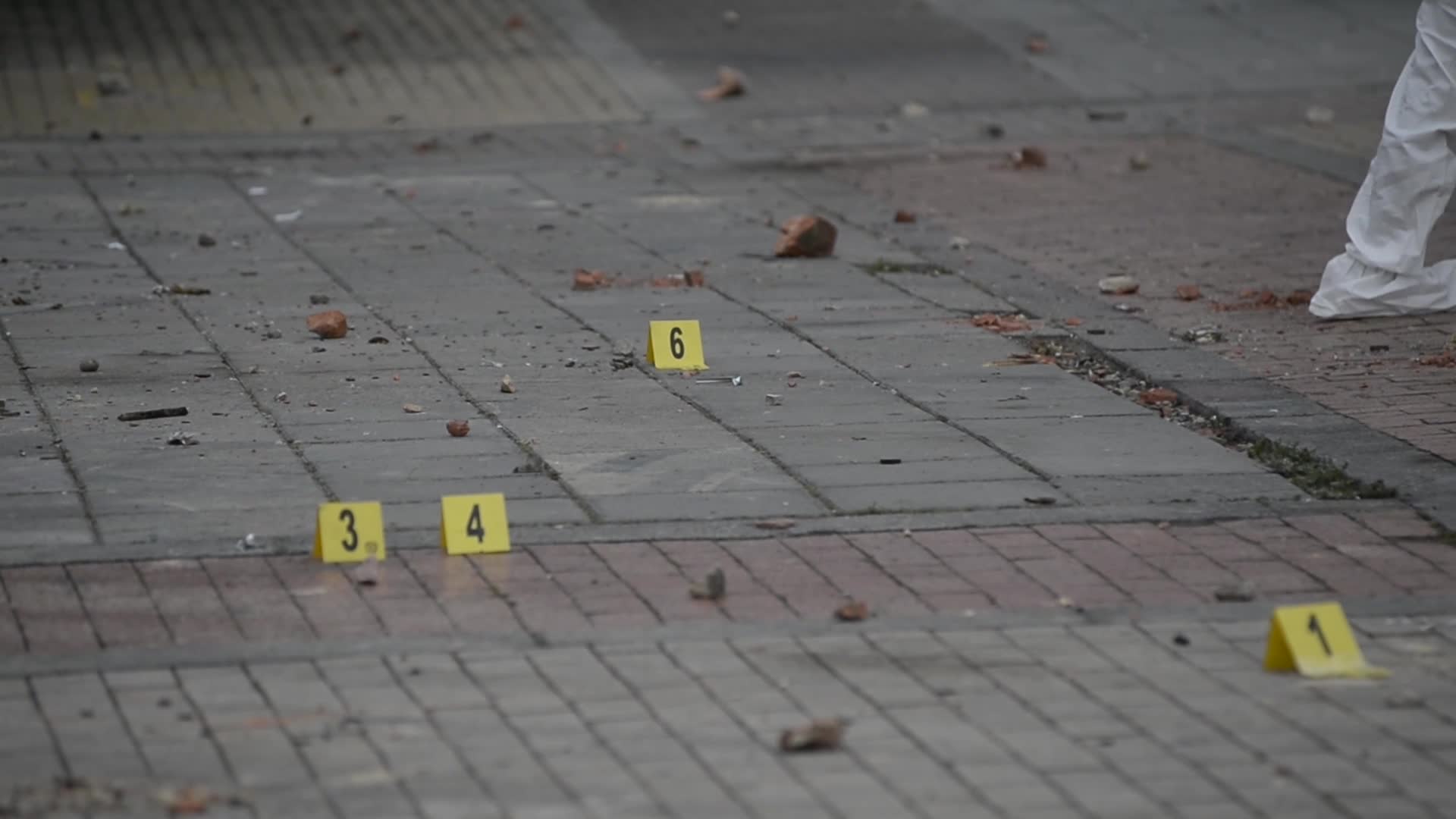 Forensic Police Recover Evidence After Two Police Officers Hit by Explosive During Clashes
