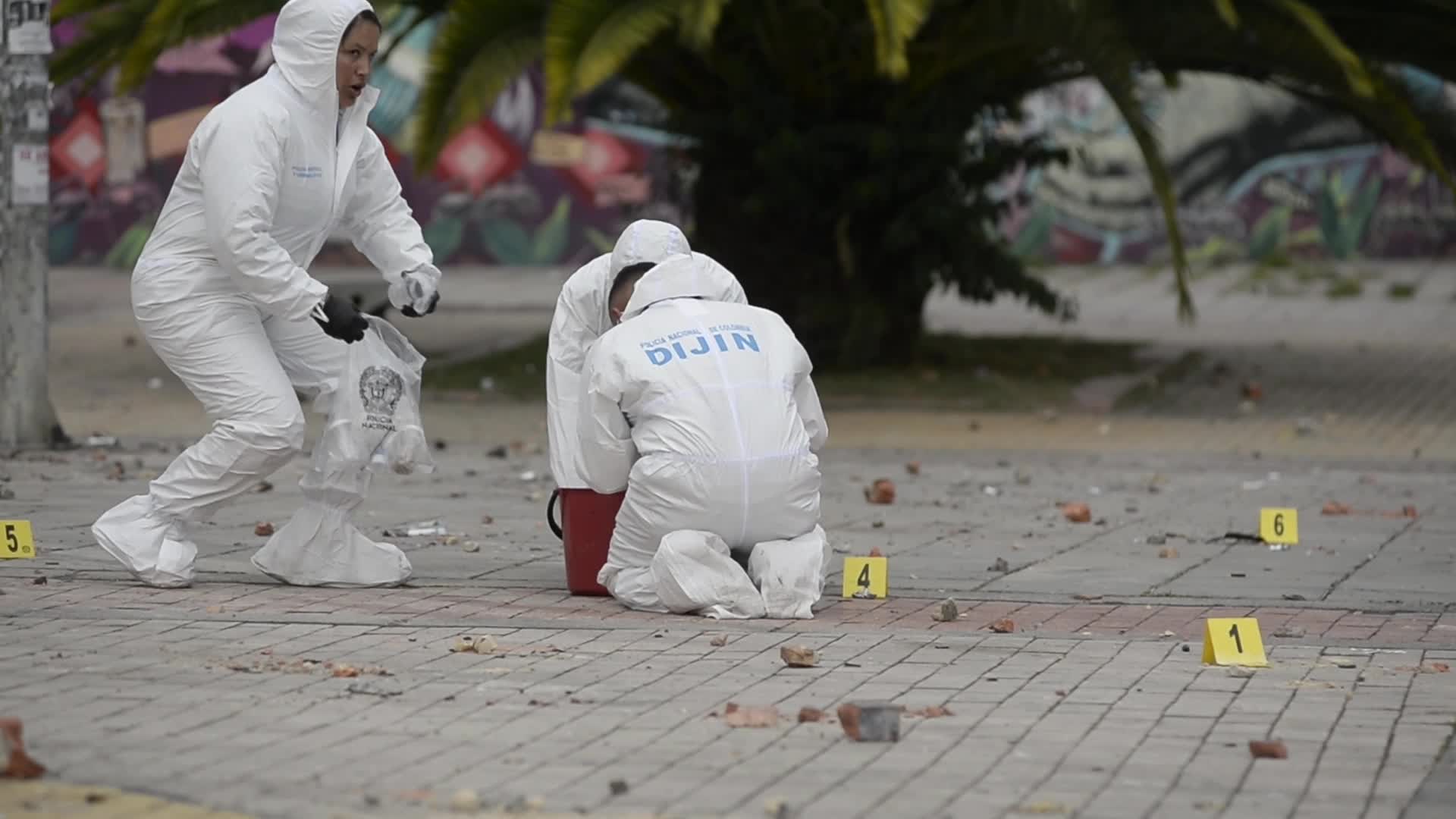 Forensic Police Recover Evidence After Two Police Officers Hit by Explosive During Clashes