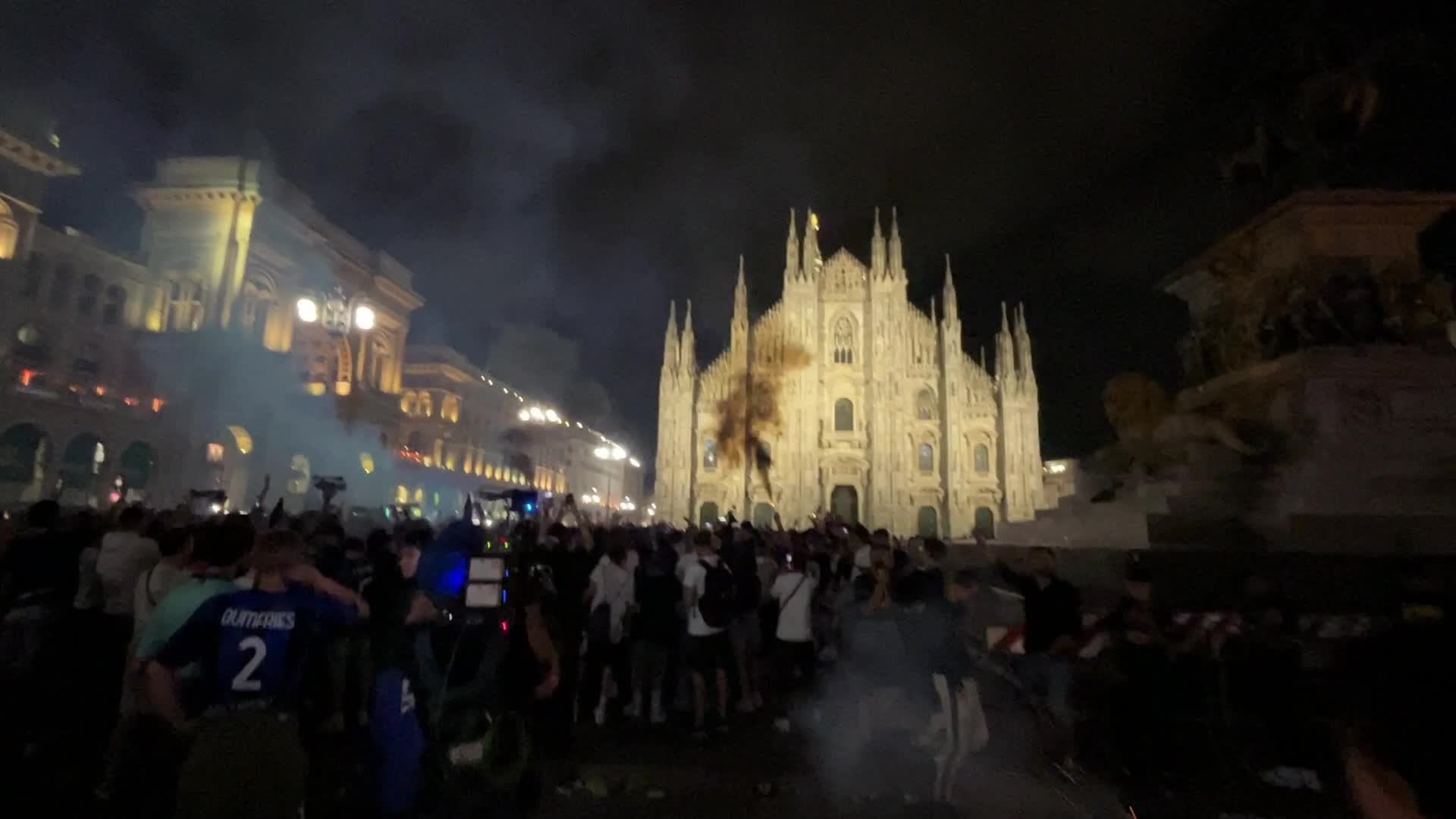 Supporters follow the UEFA Champions League final match Manchester City v FC Internazionale in Piazza Duomo in Milan