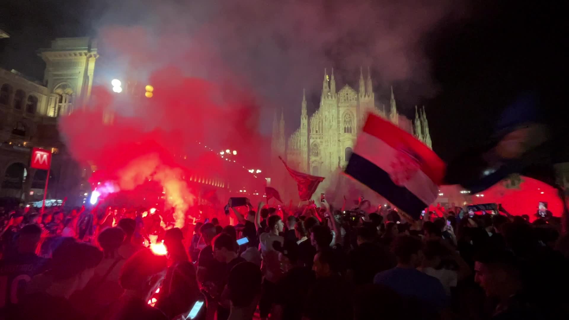Supporters follow the UEFA Champions League final match Manchester City v FC Internazionale in Piazza Duomo in Milan