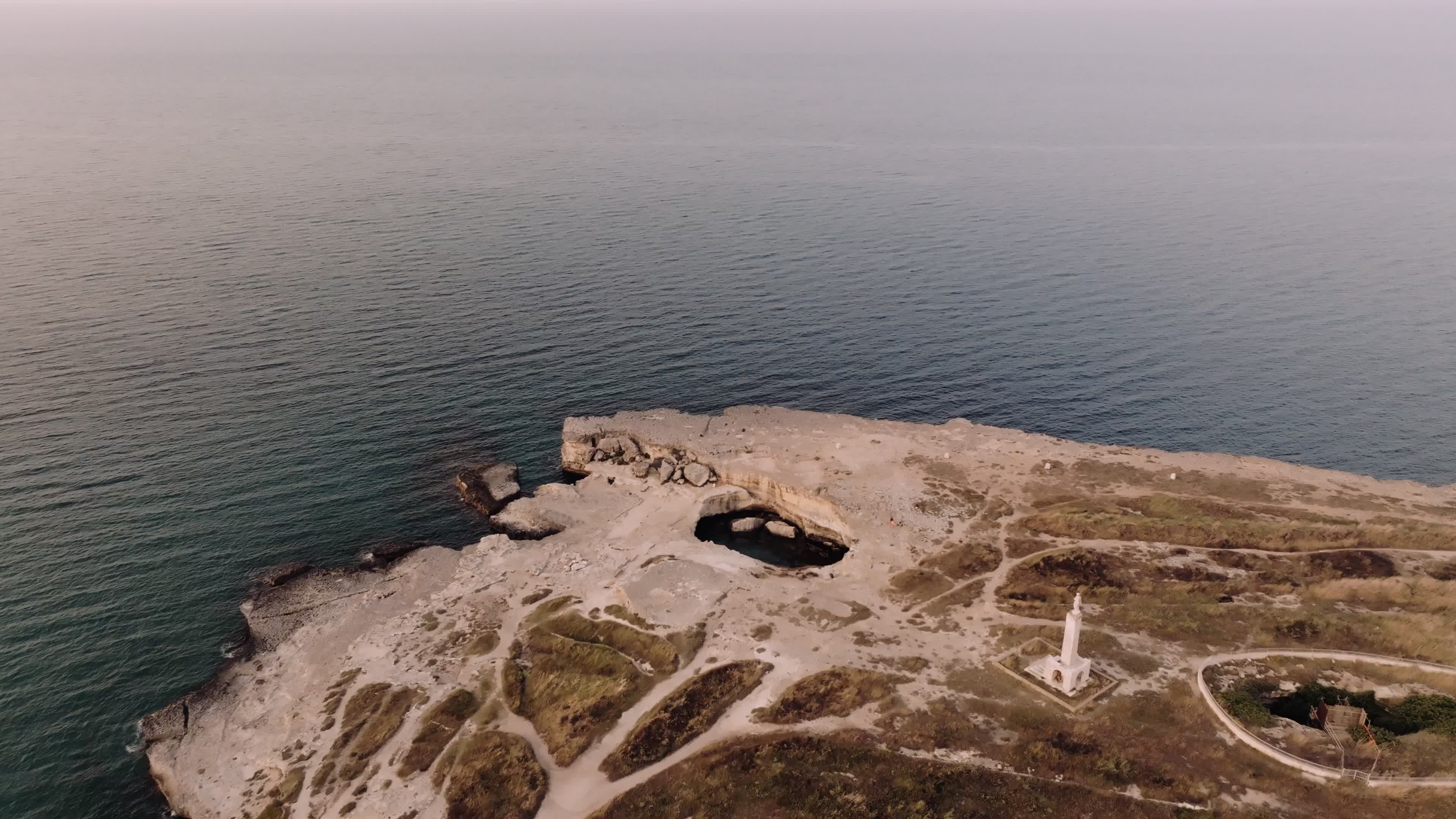 Aerial View Of Cave of Poetry At Sunset
