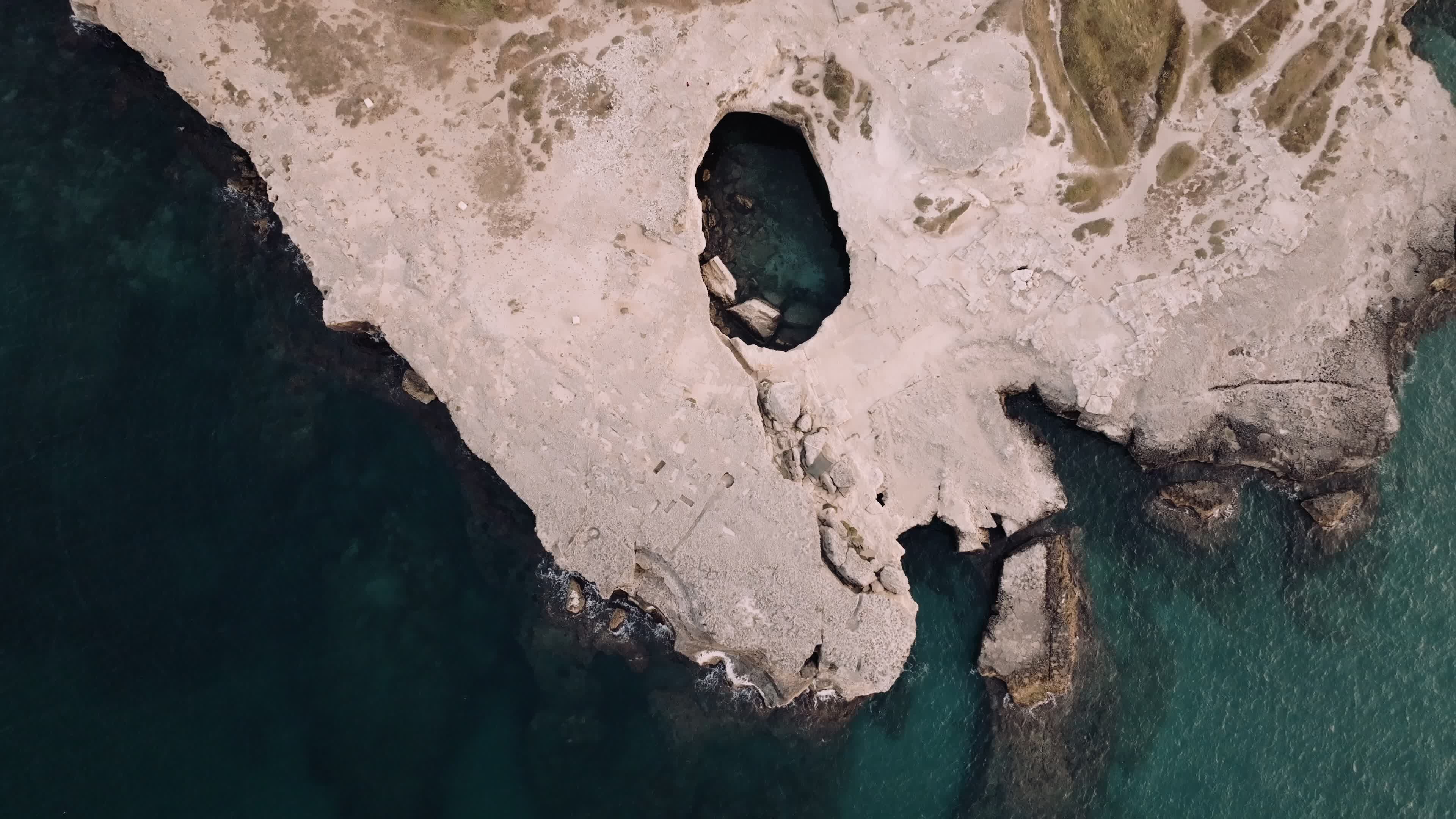 Aerial View Of Cave of Poetry At Sunset