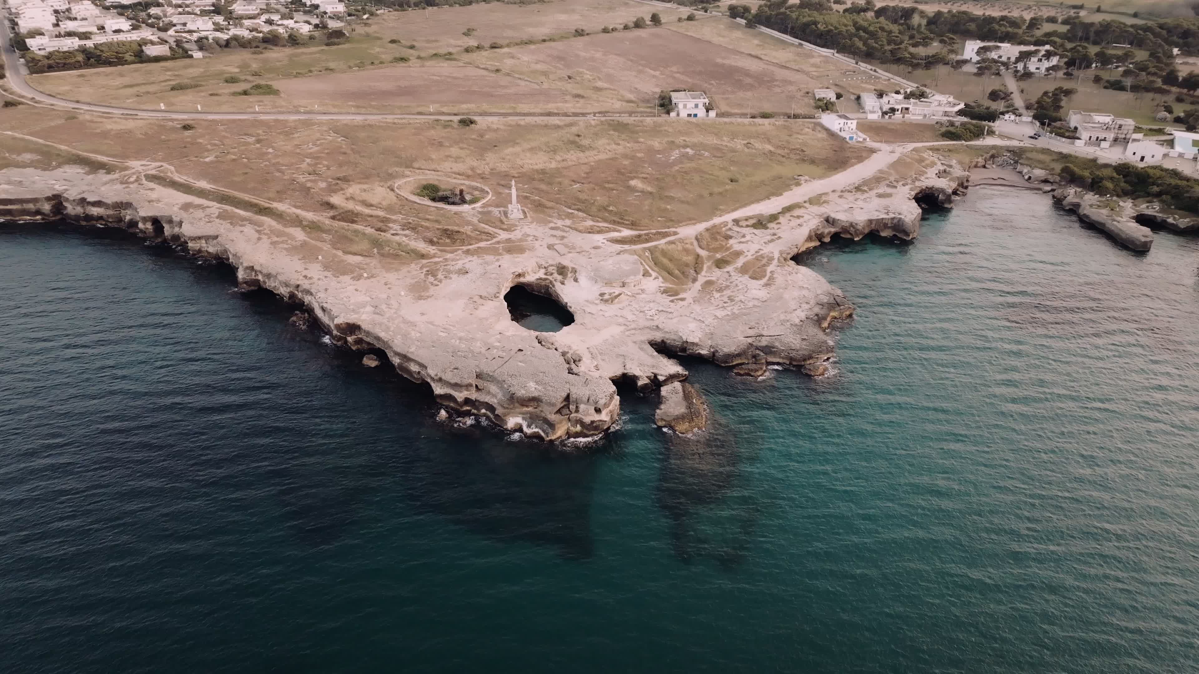 Aerial View Of Cave of Poetry At Sunset