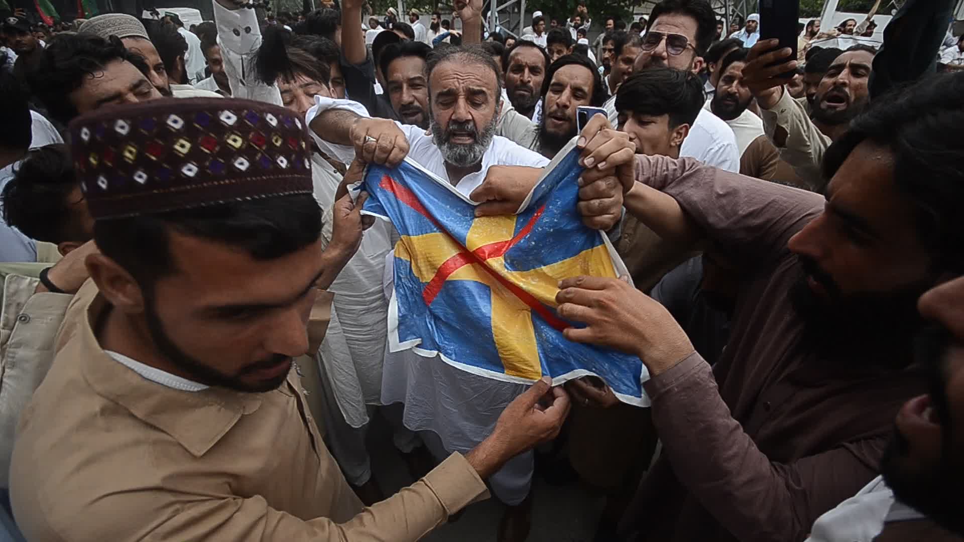 Workers of Pakistan Tehreek-e-Insaf protest across Pakistan against the burning of Holy Quran in Sweden.