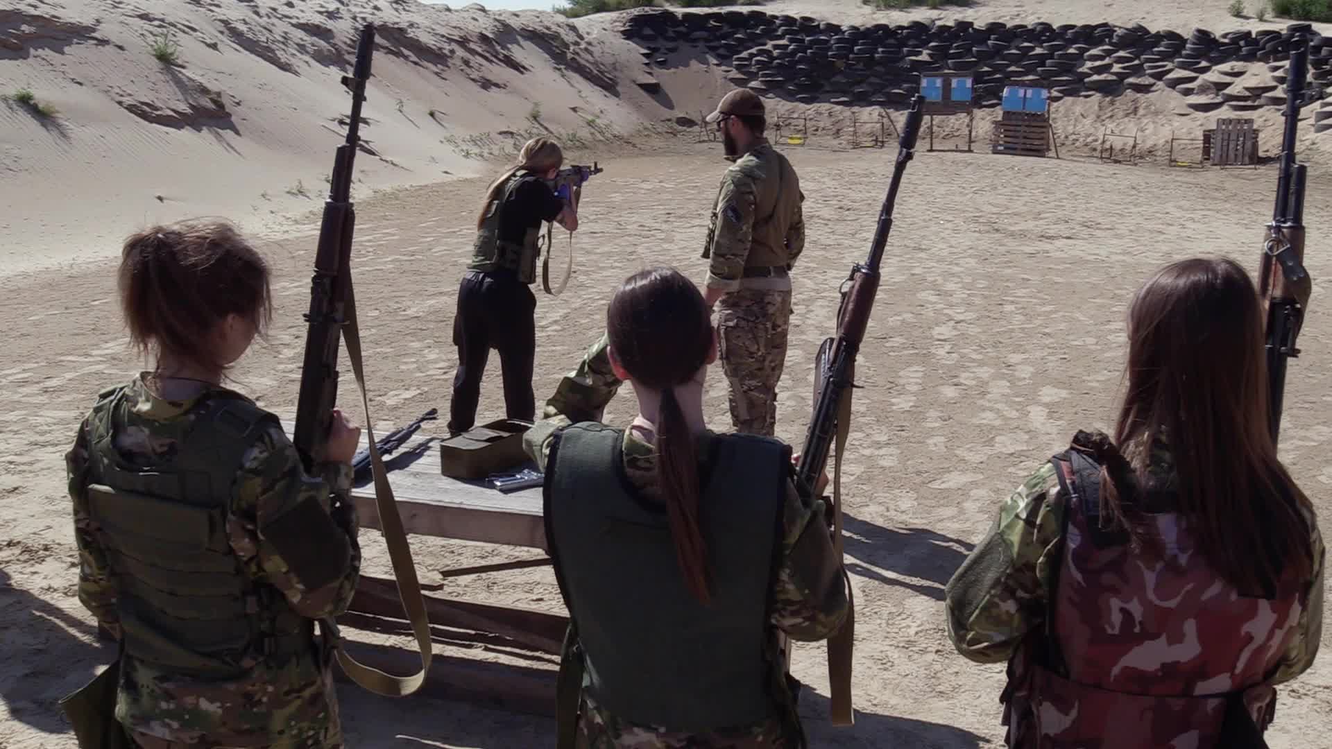 A training session and test of new military uniforms designed for women outside of Kyiv, amid Russia's invasion of Ukraine.
