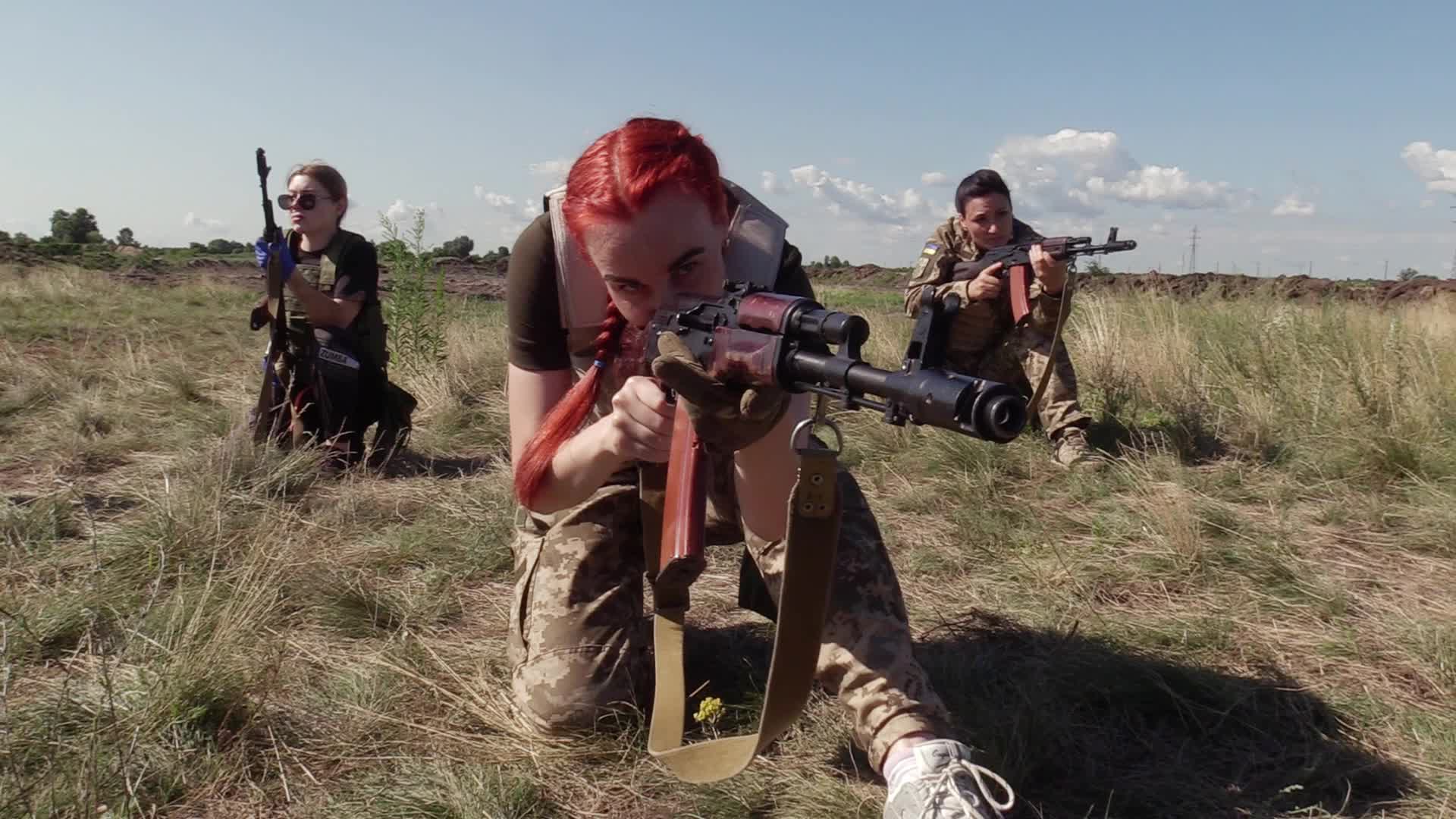 A training session and test of new military uniforms designed for women outside of Kyiv, amid Russia's invasion of Ukraine.