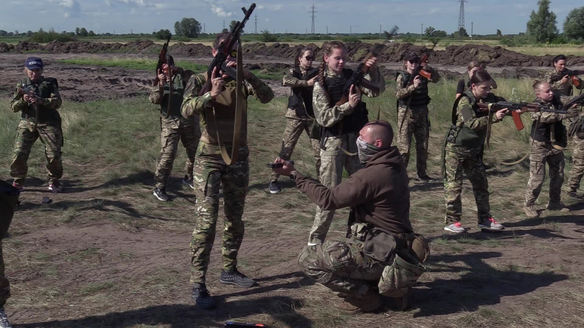 A training session and test of new military uniforms designed for women outside of Kyiv, amid Russia's invasion of Ukraine.