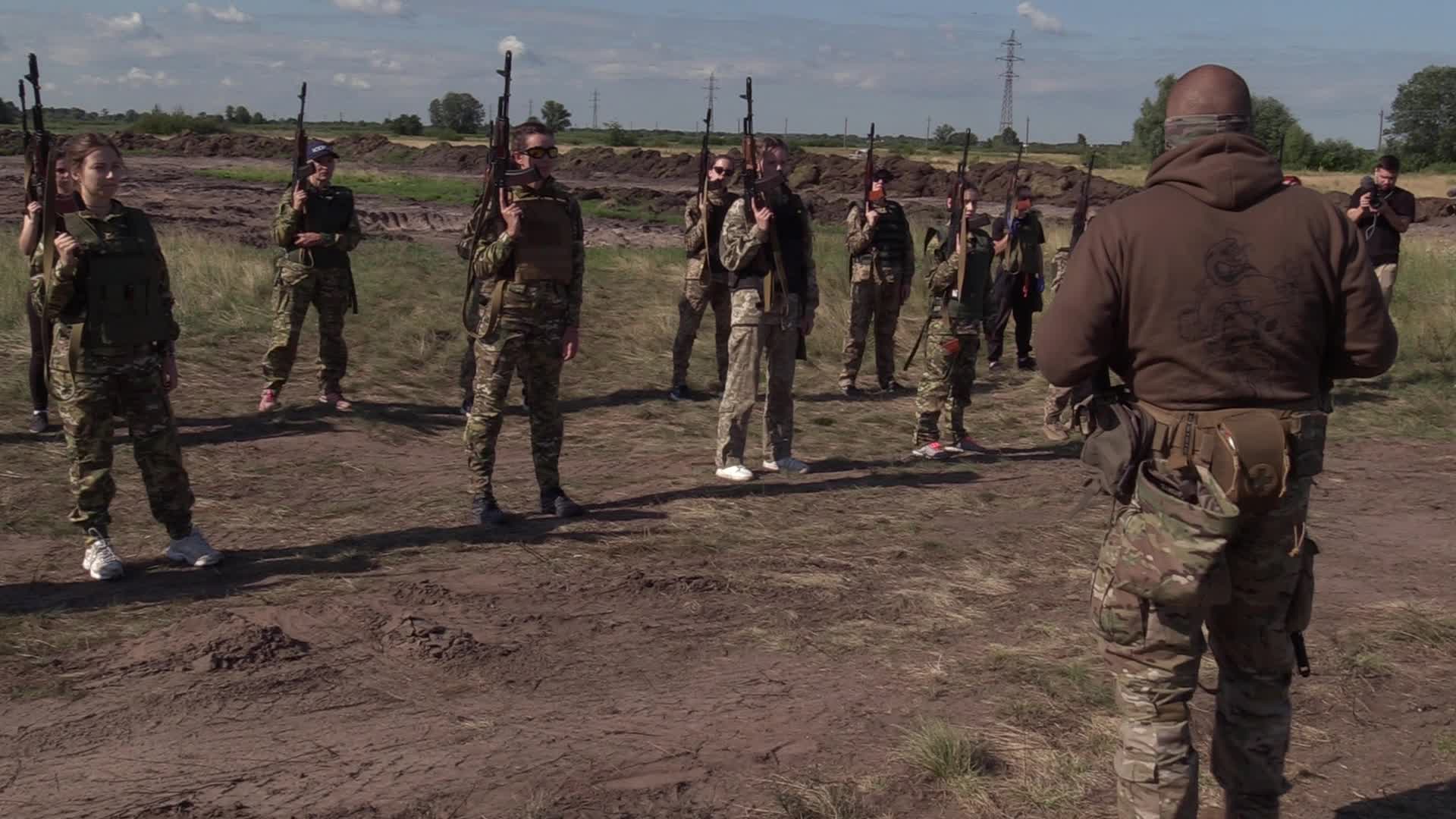 A training session and test of new military uniforms designed for women outside of Kyiv, amid Russia's invasion of Ukraine.