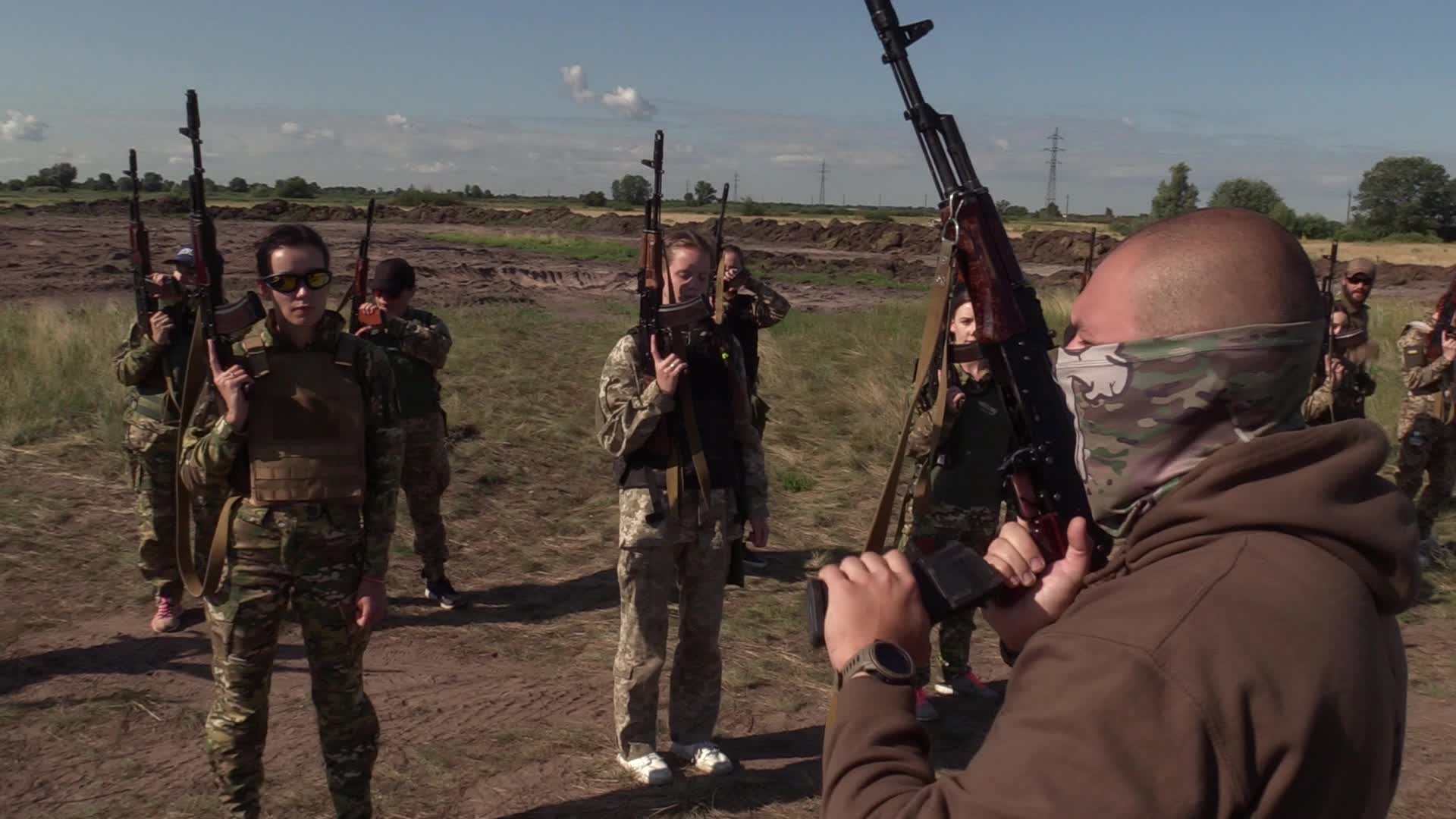 A training session and test of new military uniforms designed for women outside of Kyiv, amid Russia's invasion of Ukraine.