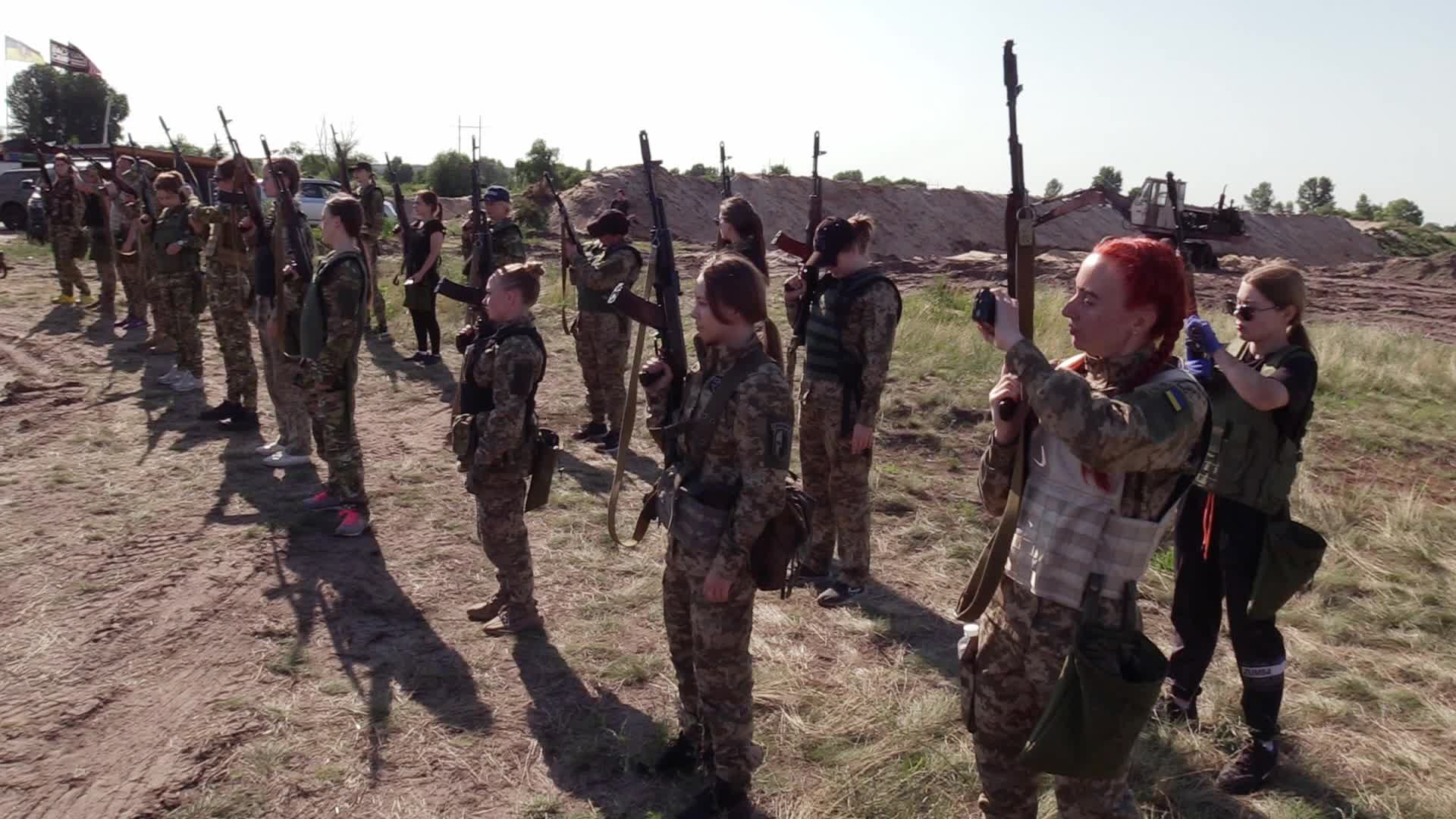 A training session and test of new military uniforms designed for women outside of Kyiv, amid Russia's invasion of Ukraine.