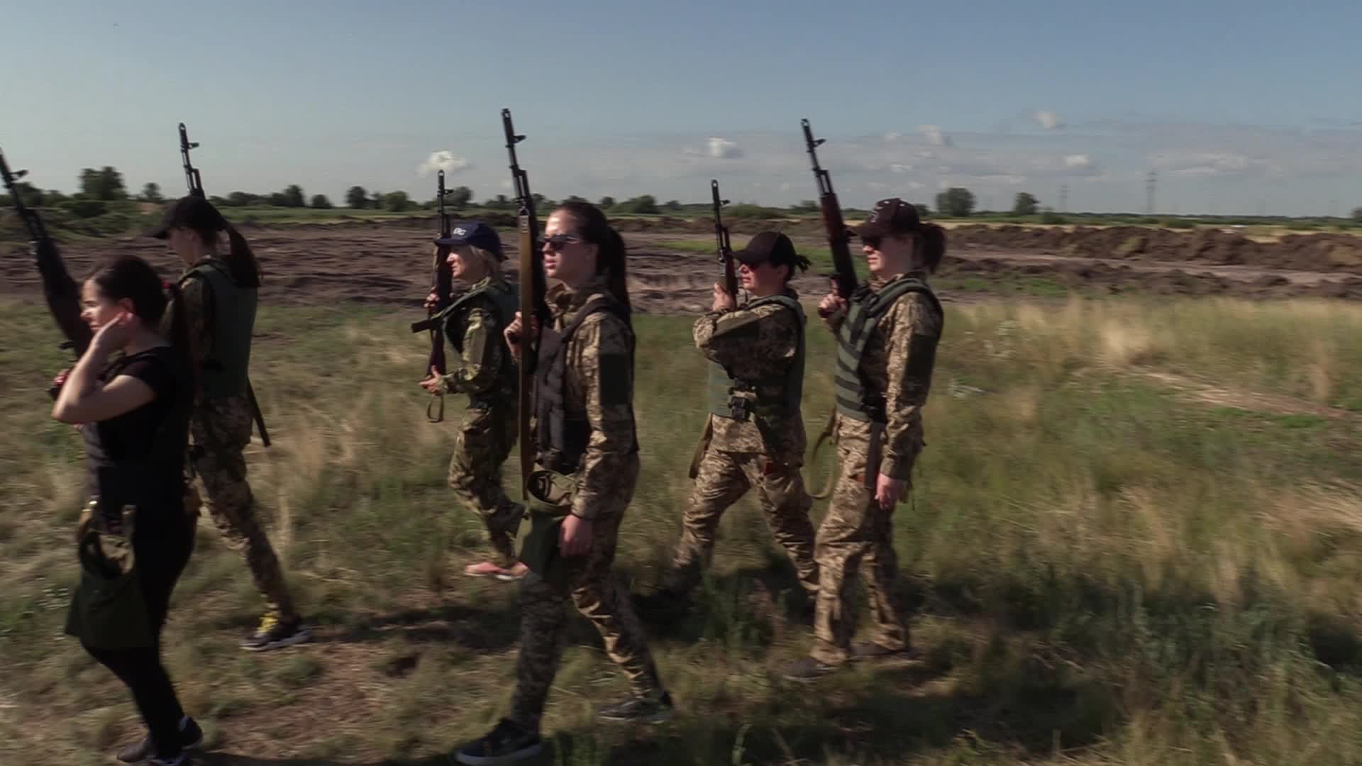 A training session and test of new military uniforms designed for women outside of Kyiv, amid Russia's invasion of Ukraine.