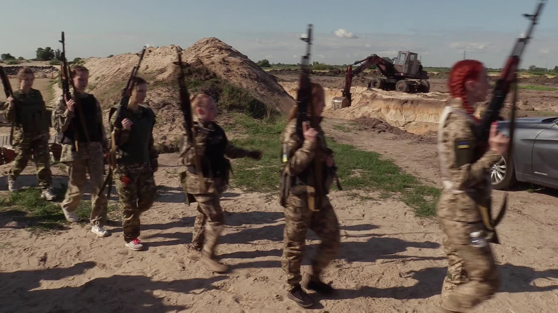 A training session and test of new military uniforms designed for women outside of Kyiv, amid Russia's invasion of Ukraine.