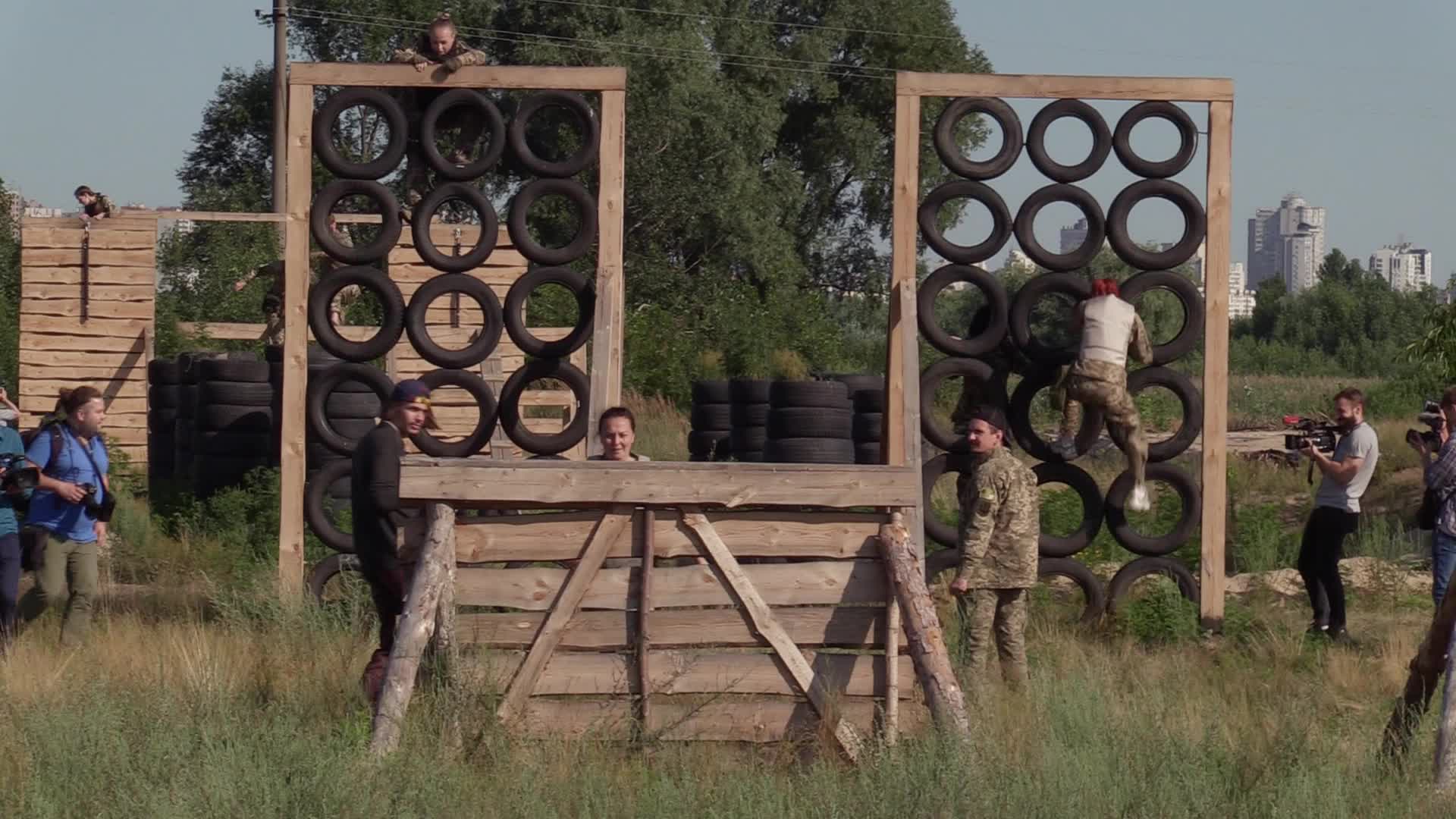 A training session and test of new military uniforms designed for women outside of Kyiv, amid Russia's invasion of Ukraine.