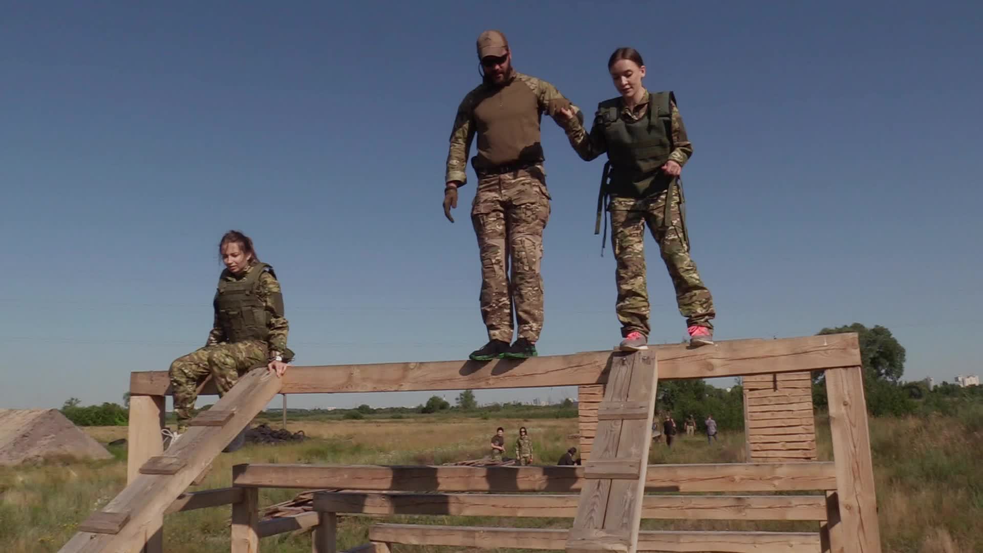 A training session and test of new military uniforms designed for women outside of Kyiv, amid Russia's invasion of Ukraine.