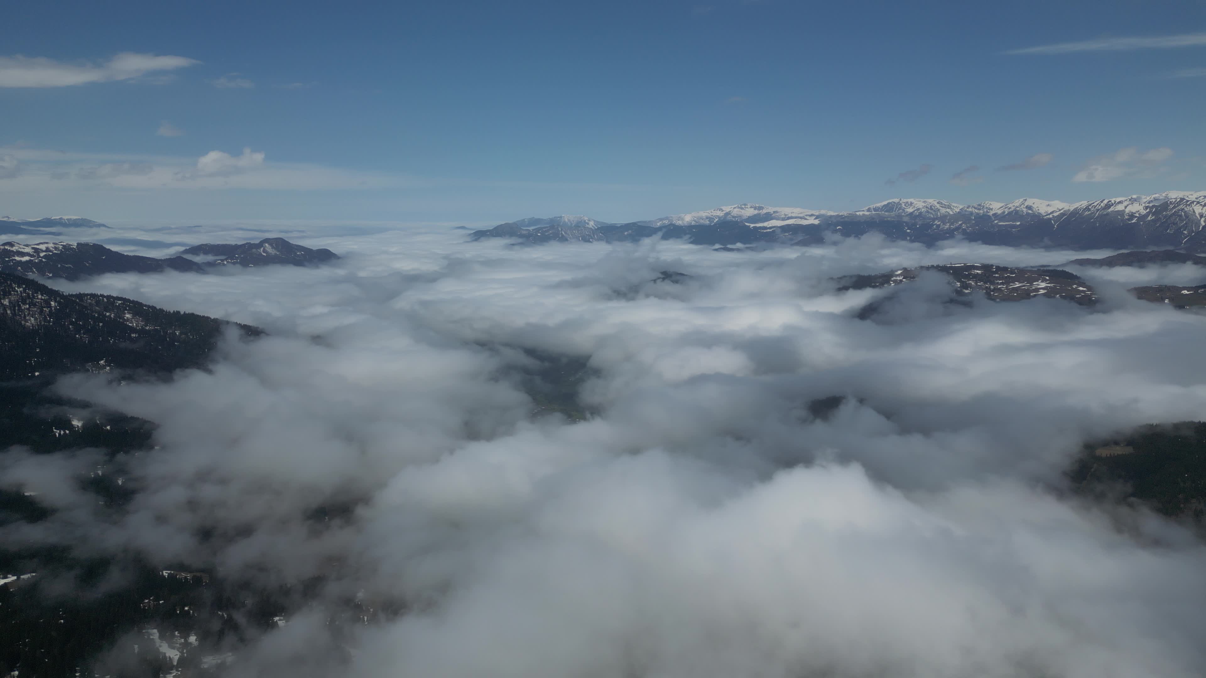 Drone videos of clouds above the mountains of Georgia