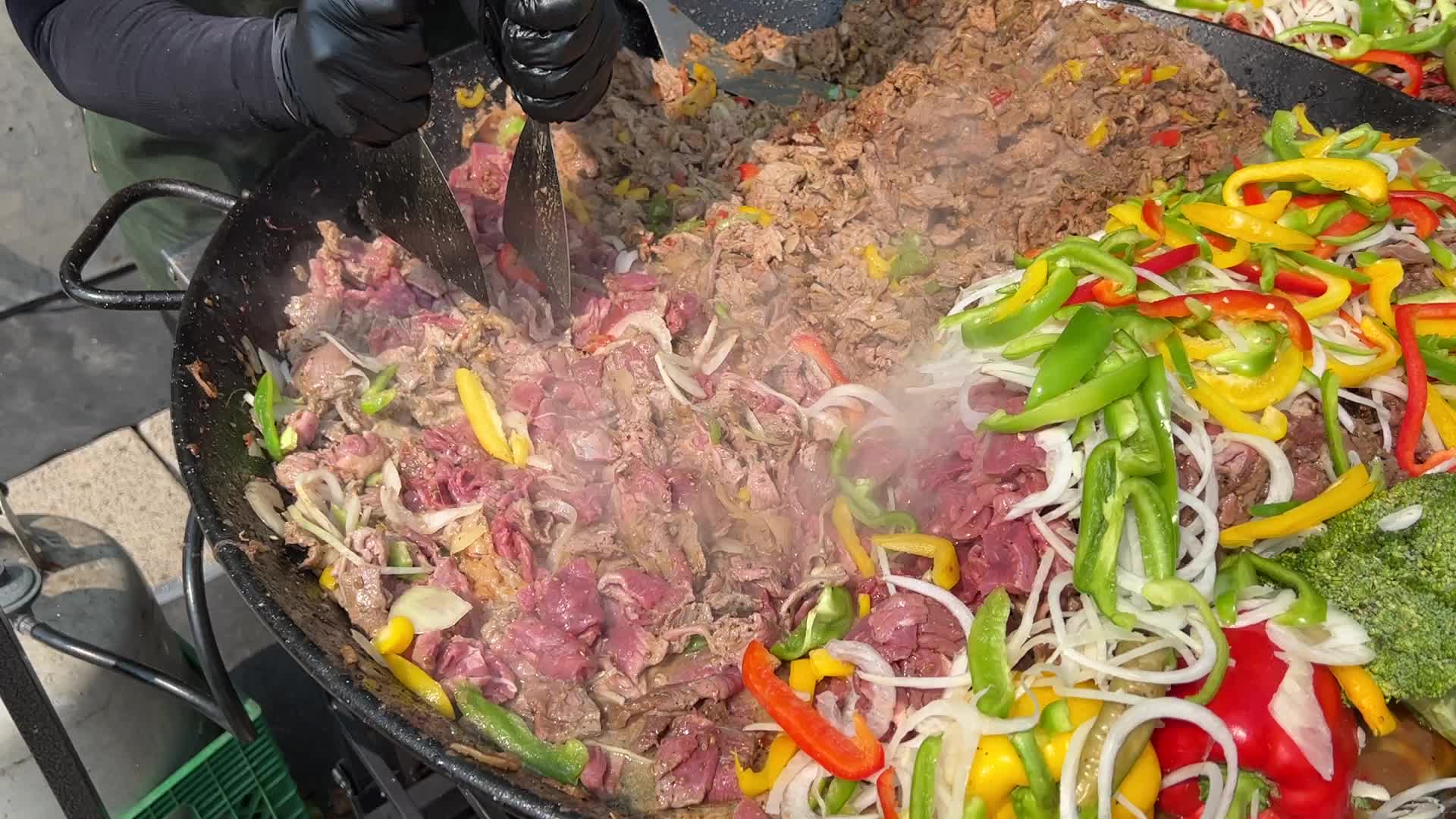 Halal food is prepared during the Taste of the Middle East Food Festival