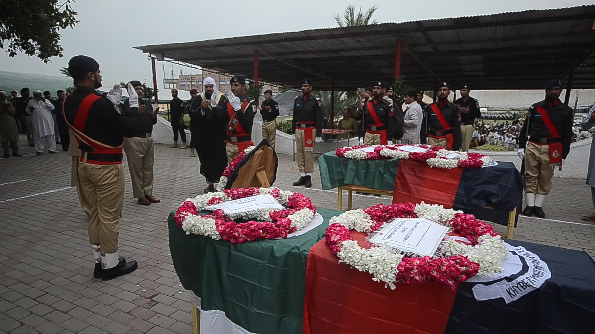 Funeral of two police personnel killed in gun attack at a checkpoint in Peshawar
