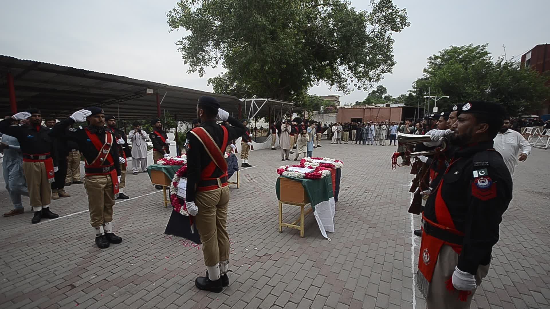 Funeral of two police personnel killed in gun attack at a checkpoint in Peshawar
