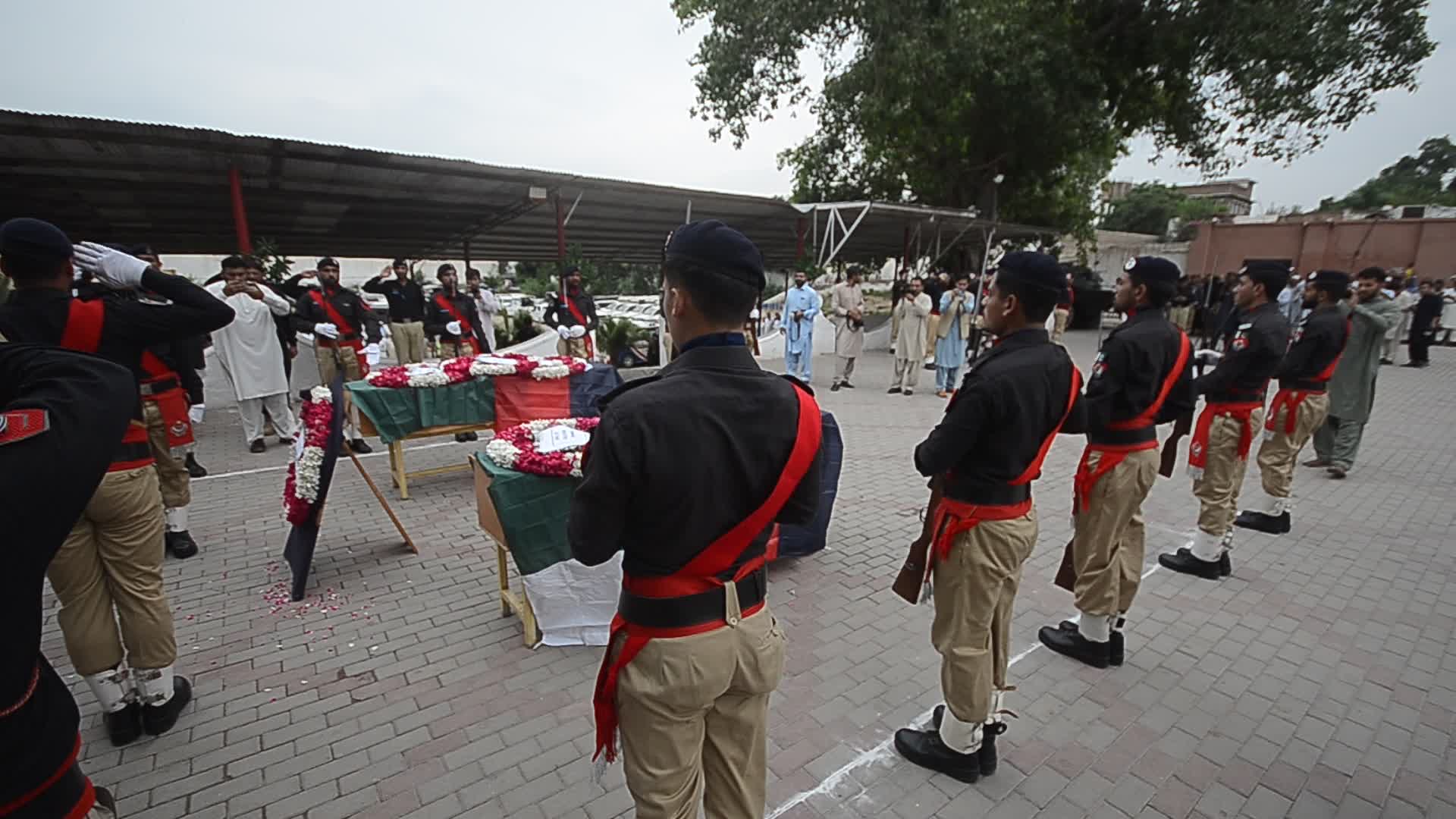 Funeral of two police personnel killed in gun attack at a checkpoint in Peshawar
