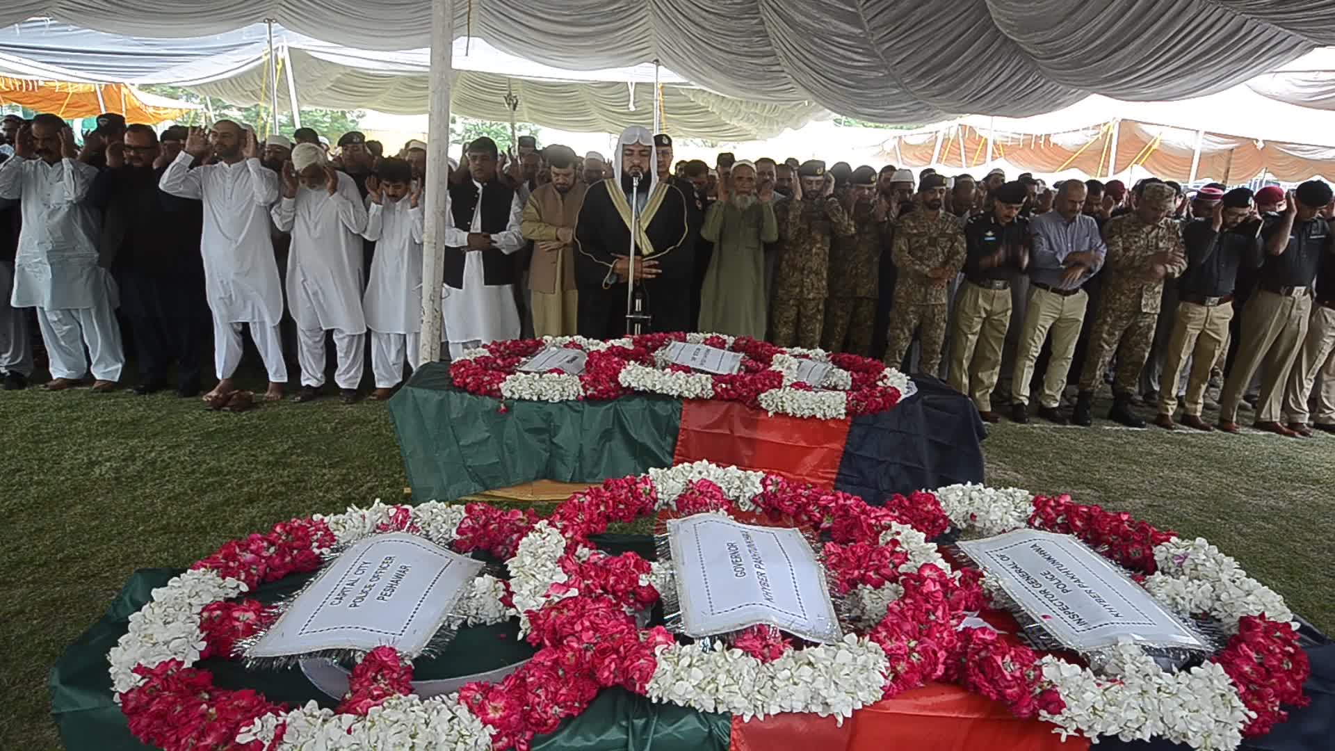 Funeral of two police personnel killed in gun attack at a checkpoint in Peshawar
