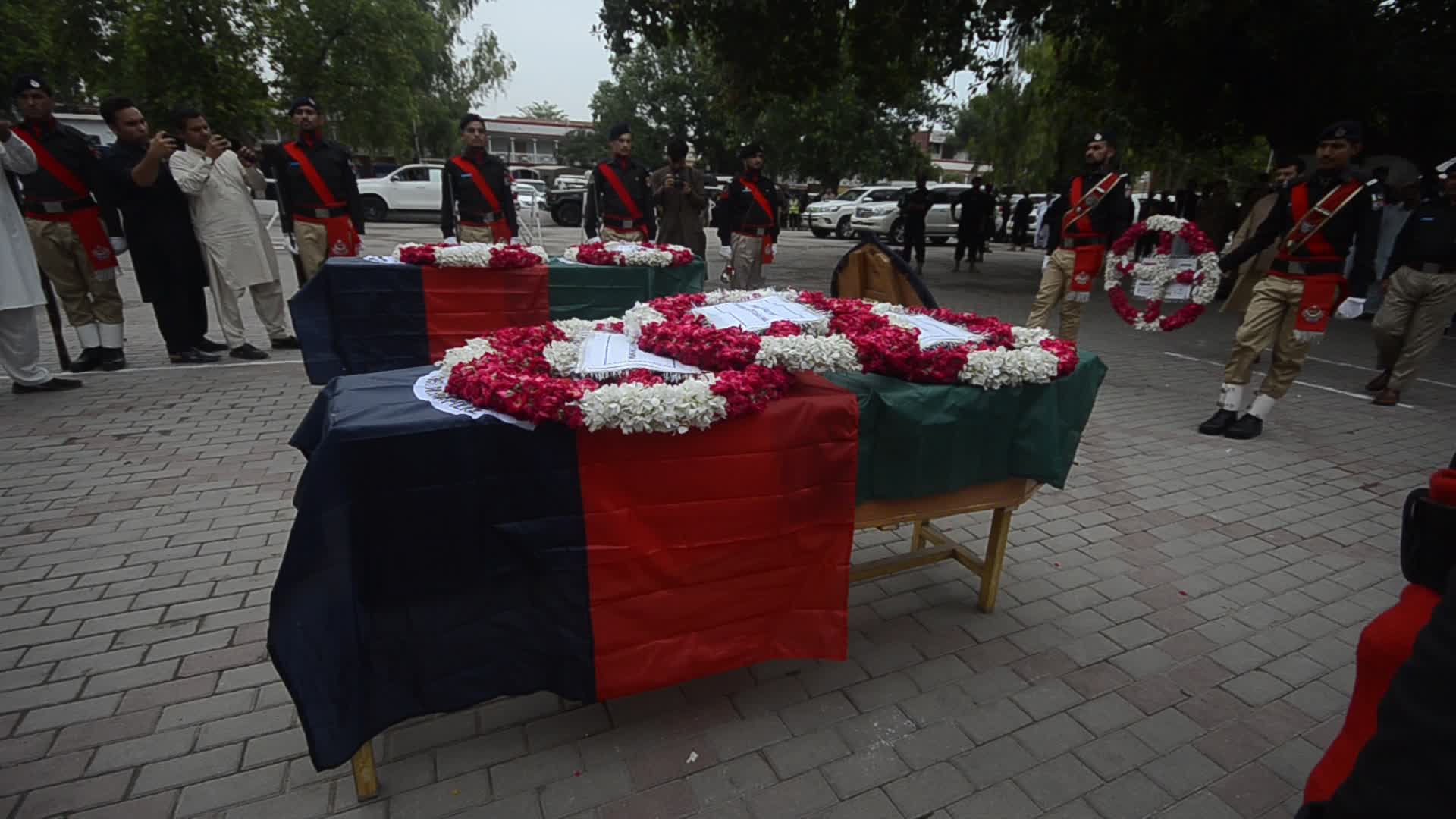 Funeral of two police personnel killed in gun attack at a checkpoint in Peshawar
